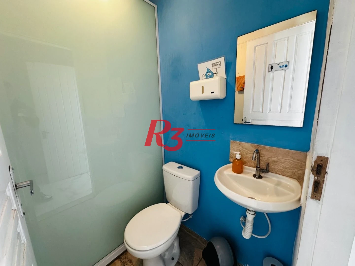 Sobrado com 4 dormitórios à venda, 245 m² por R$ 1.500.000,00 - Ponta da Praia - Santos/SP
