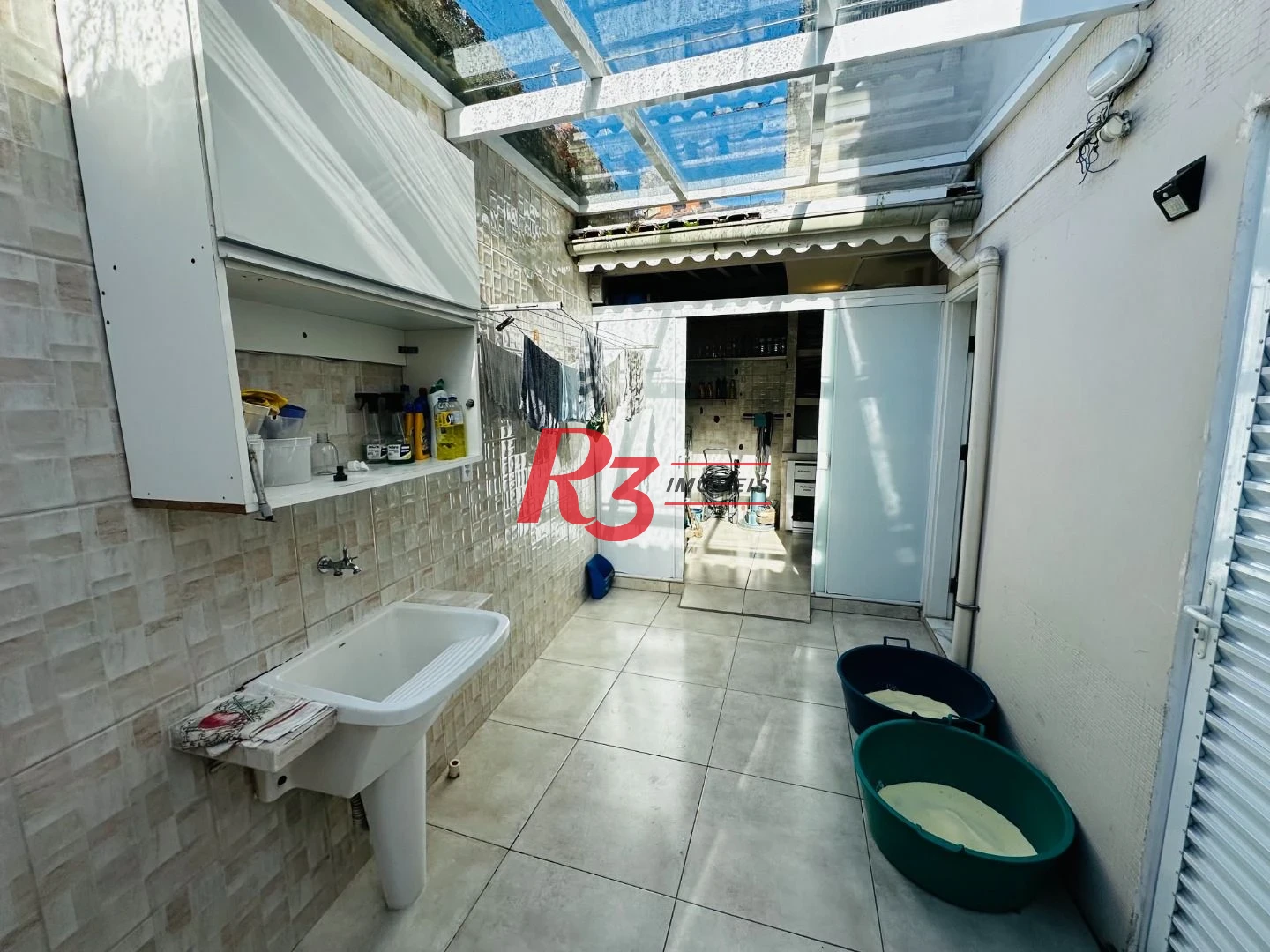 Sobrado com 4 dormitórios à venda, 245 m² por R$ 1.500.000,00 - Ponta da Praia - Santos/SP