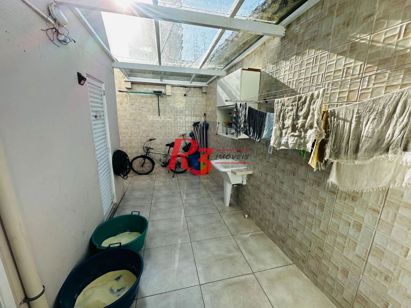 Sobrado com 4 dormitórios à venda, 245 m² por R$ 1.500.000,00 - Ponta da Praia - Santos/SP