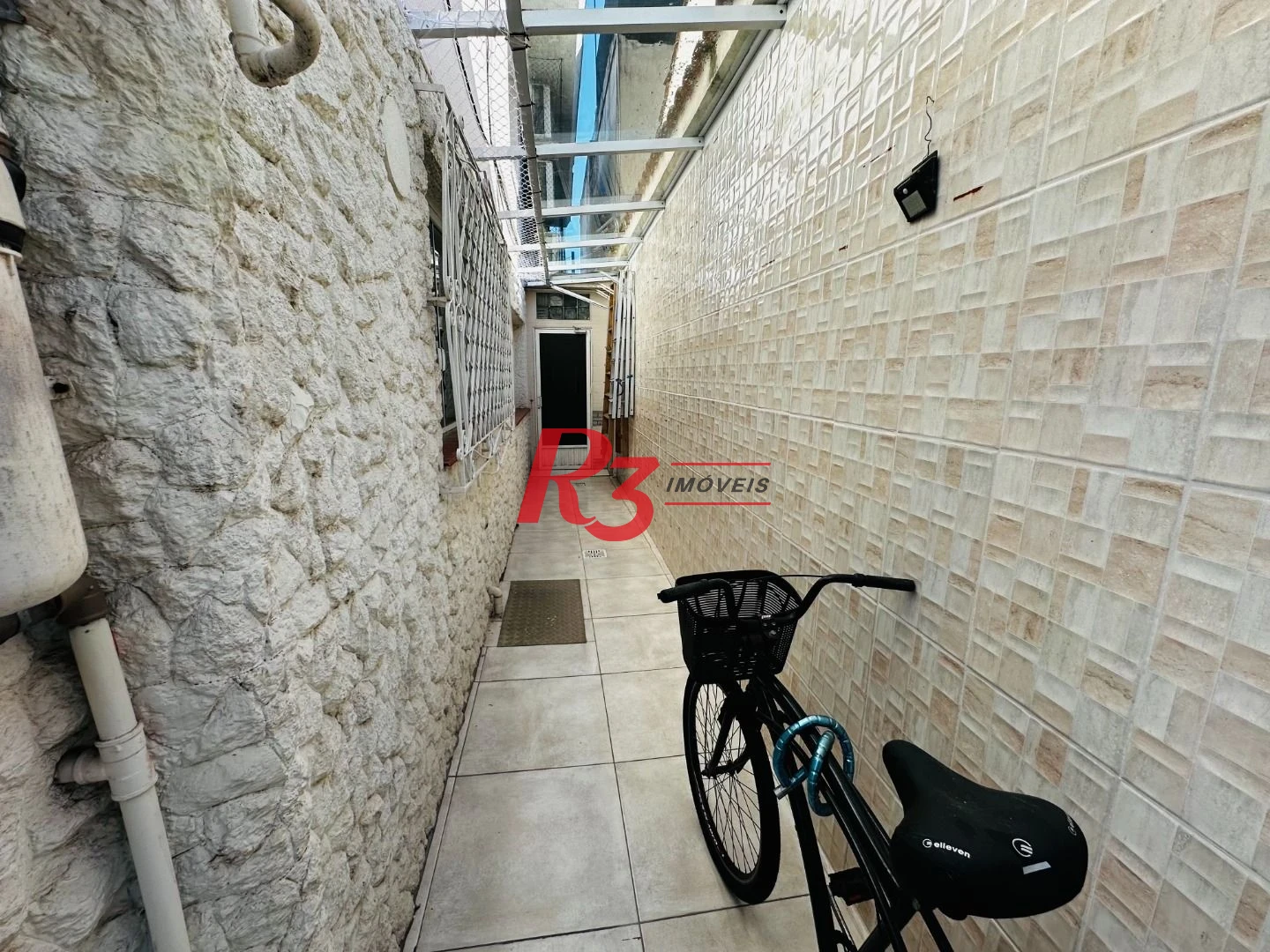 Sobrado com 4 dormitórios à venda, 245 m² por R$ 1.500.000,00 - Ponta da Praia - Santos/SP