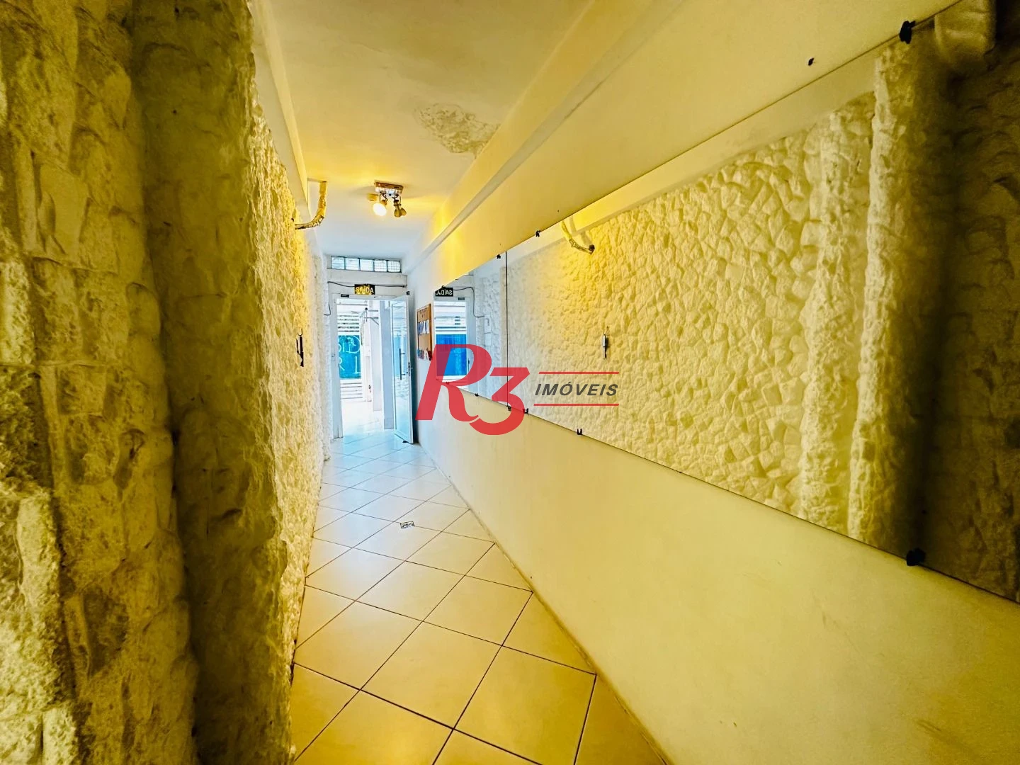 Sobrado com 4 dormitórios à venda, 245 m² por R$ 1.500.000,00 - Ponta da Praia - Santos/SP