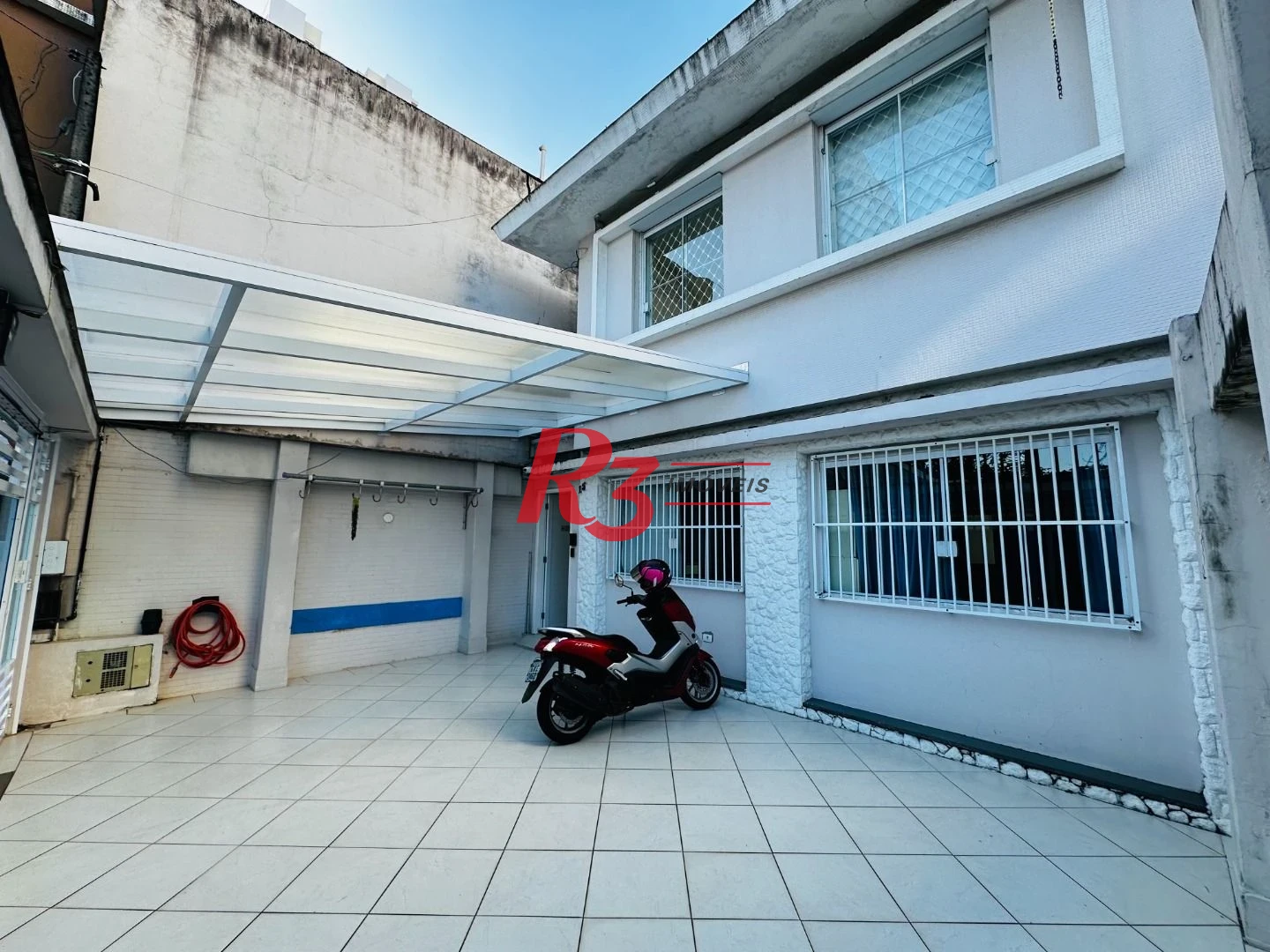 Sobrado com 4 dormitórios à venda, 245 m² por R$ 1.500.000,00 - Ponta da Praia - Santos/SP