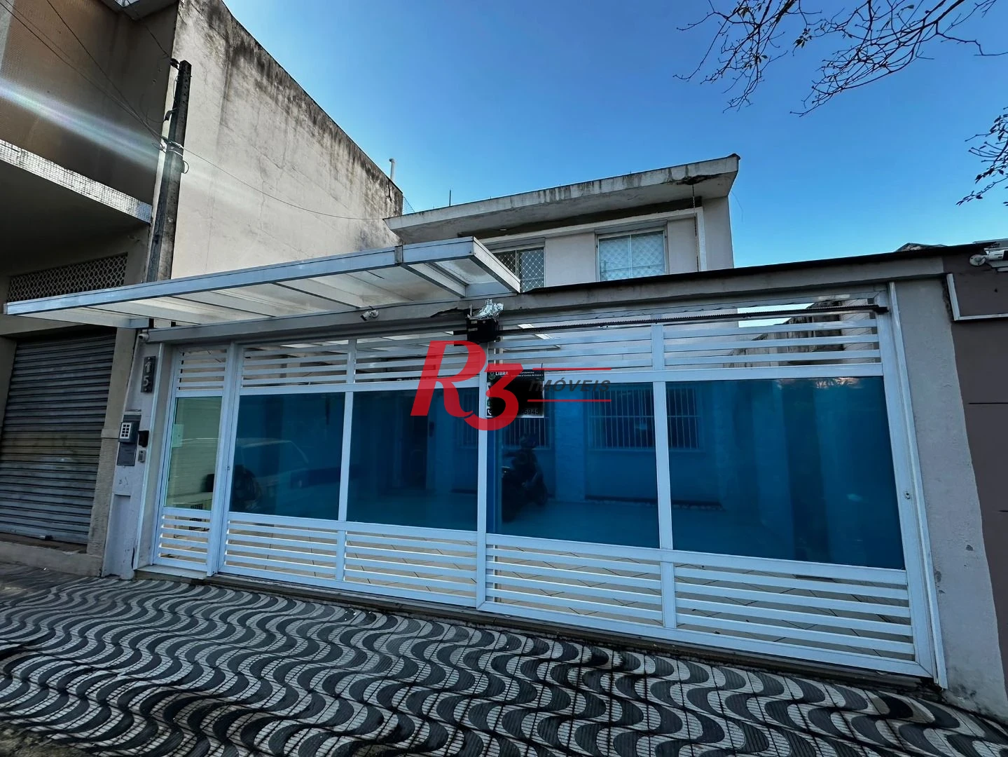 Sobrado com 4 dormitórios à venda, 245 m² por R$ 1.500.000,00 - Ponta da Praia - Santos/SP