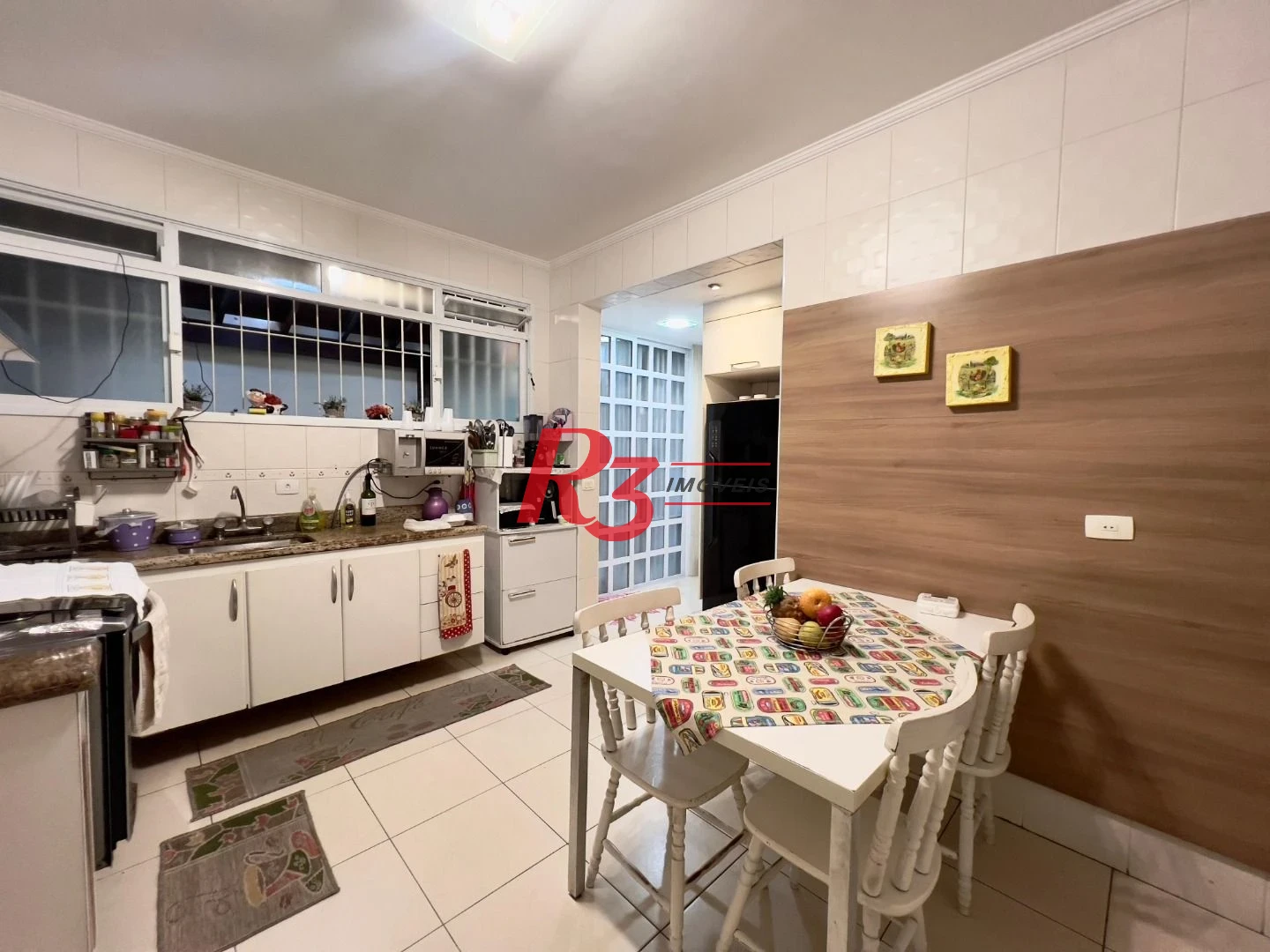 Casa com 3 dormitórios à venda, 182 m² por R$ 1.400.000,00 - Embaré - Santos/SP