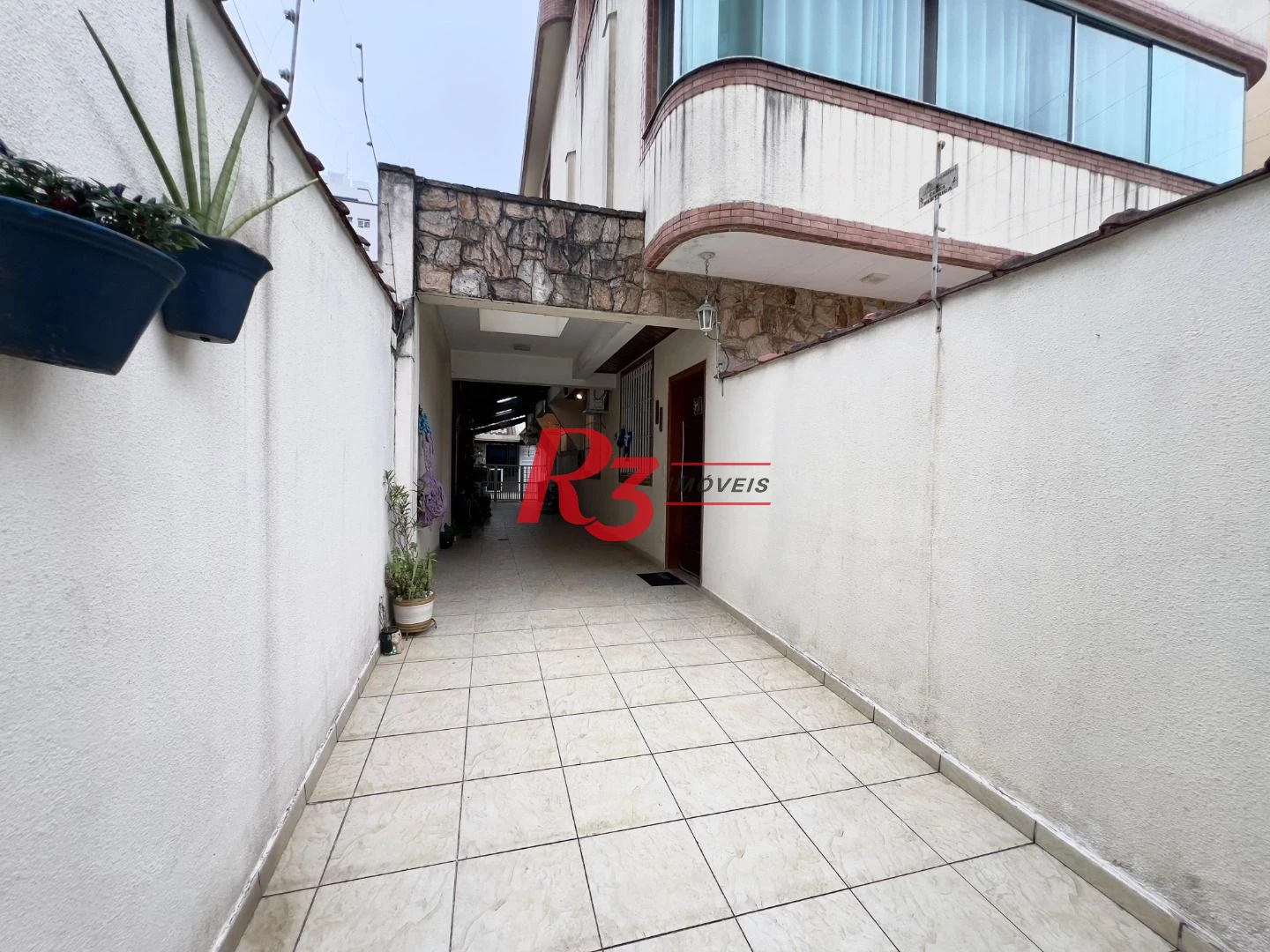 Casa com 3 dormitórios à venda, 182 m² por R$ 1.400.000,00 - Embaré - Santos/SP