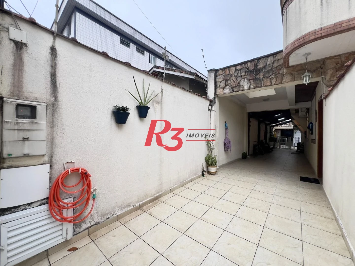 Casa com 3 dormitórios à venda, 182 m² por R$ 1.400.000,00 - Embaré - Santos/SP