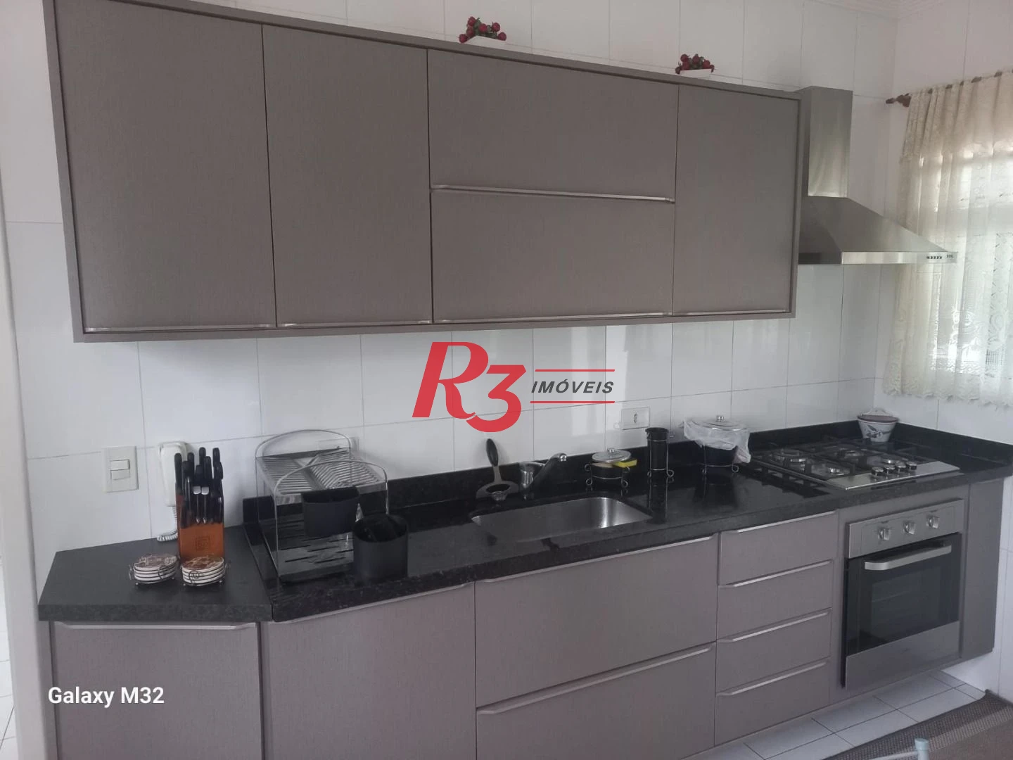 Casa com 3 dormitórios à venda, 160 m² por R$ 1.610.000,00 - Aparecida - Santos/SP