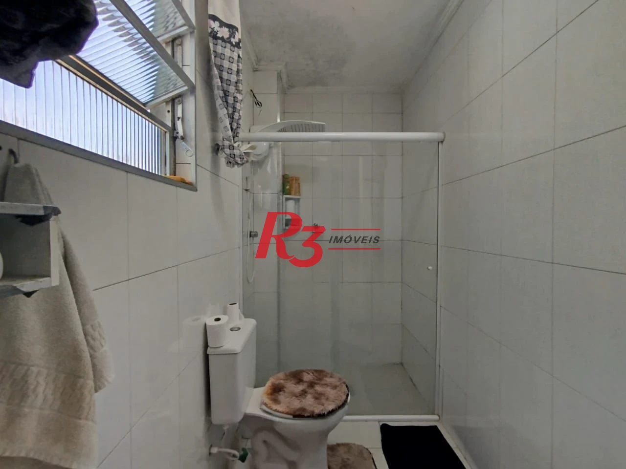 Apartamento com 3 dormitórios à venda, 68 m² por R$ 395.000,00 - Macuco - Santos/SP