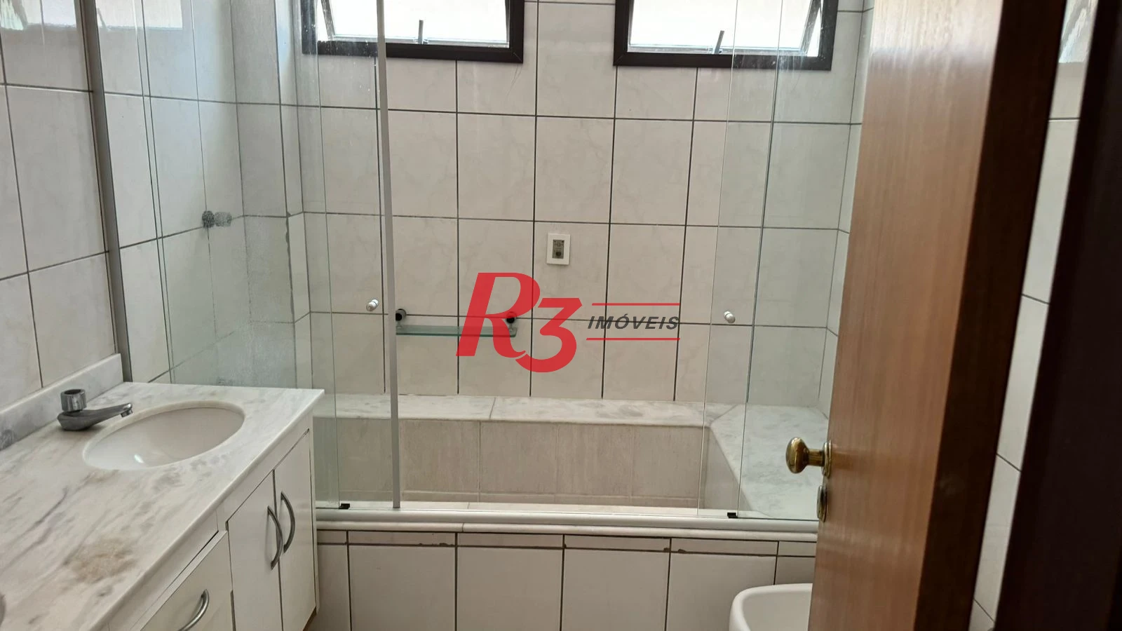 Apartamento com 3 dormitórios à venda, 200 m² por R$ 1.850.000,00 - Embaré - Santos/SP