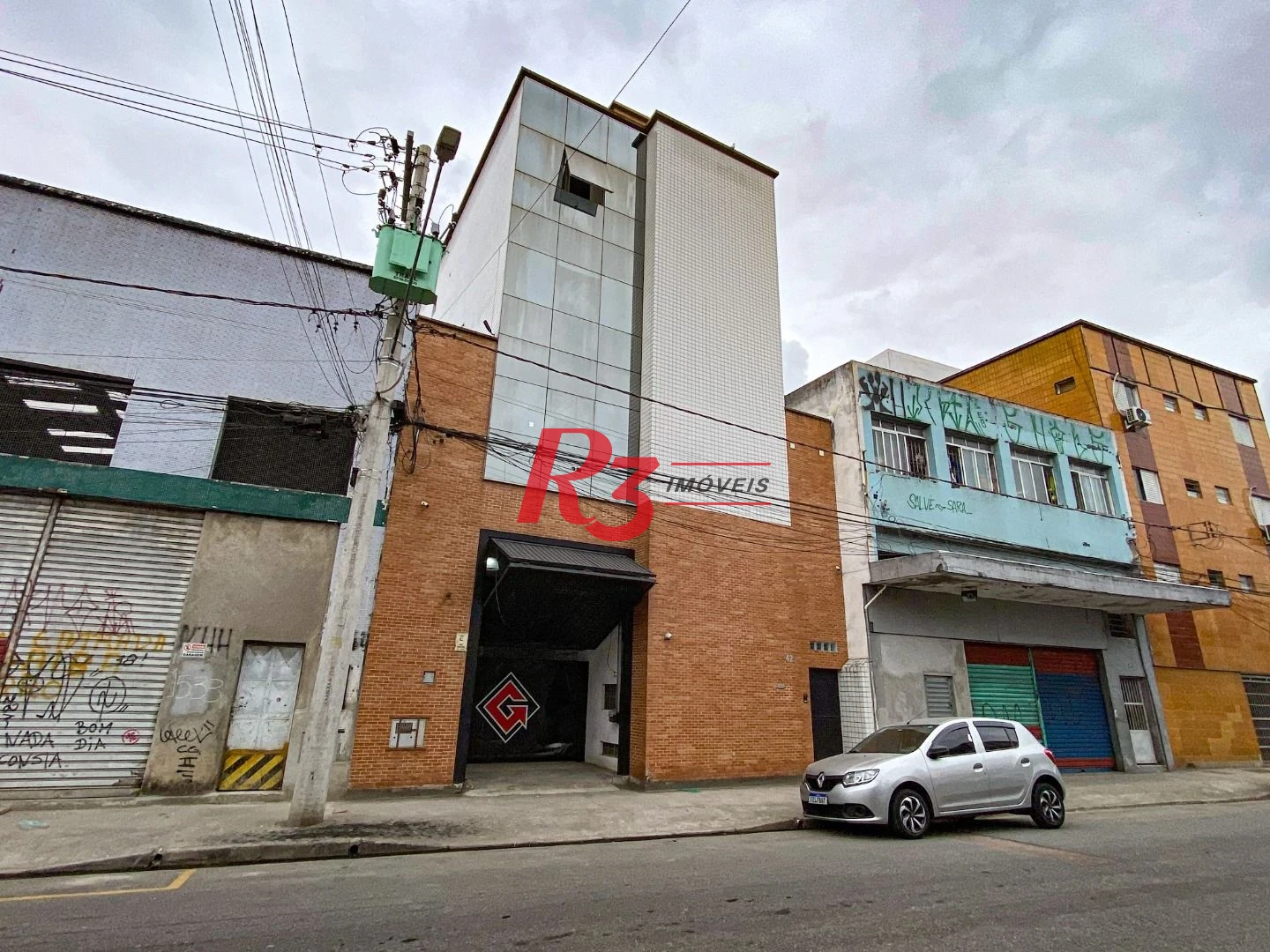 Prédio, 666 m² - venda por R$ 2.500.000,00 ou aluguel por R$ 25.000,00/mês - Vila Nova - Santos/SP
