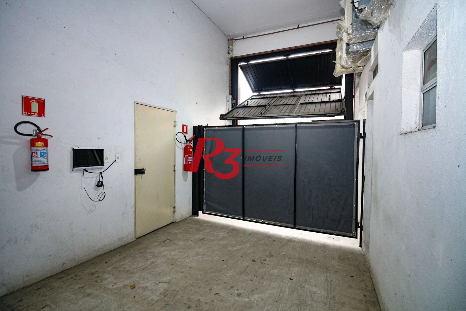 Prédio, 666 m² - venda por R$ 2.500.000,00 ou aluguel por R$ 25.000,00/mês - Vila Nova - Santos/SP