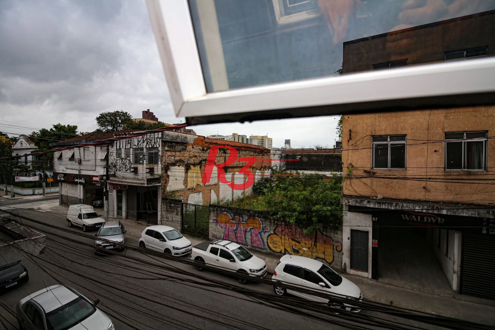 Prédio, 666 m² - venda por R$ 2.500.000,00 ou aluguel por R$ 25.000,00/mês - Vila Nova - Santos/SP