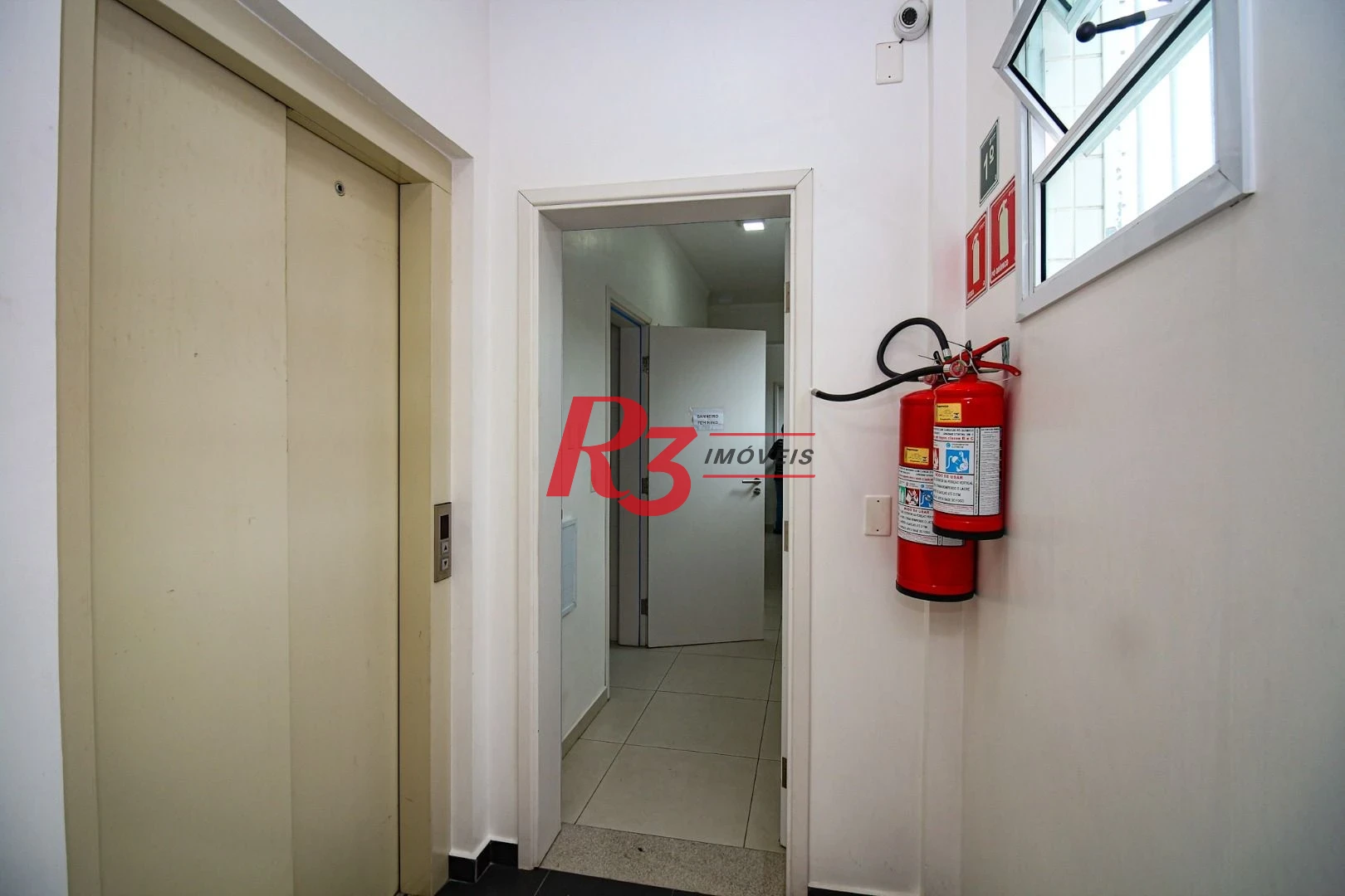 Prédio, 666 m² - venda por R$ 2.500.000,00 ou aluguel por R$ 25.000,00/mês - Vila Nova - Santos/SP