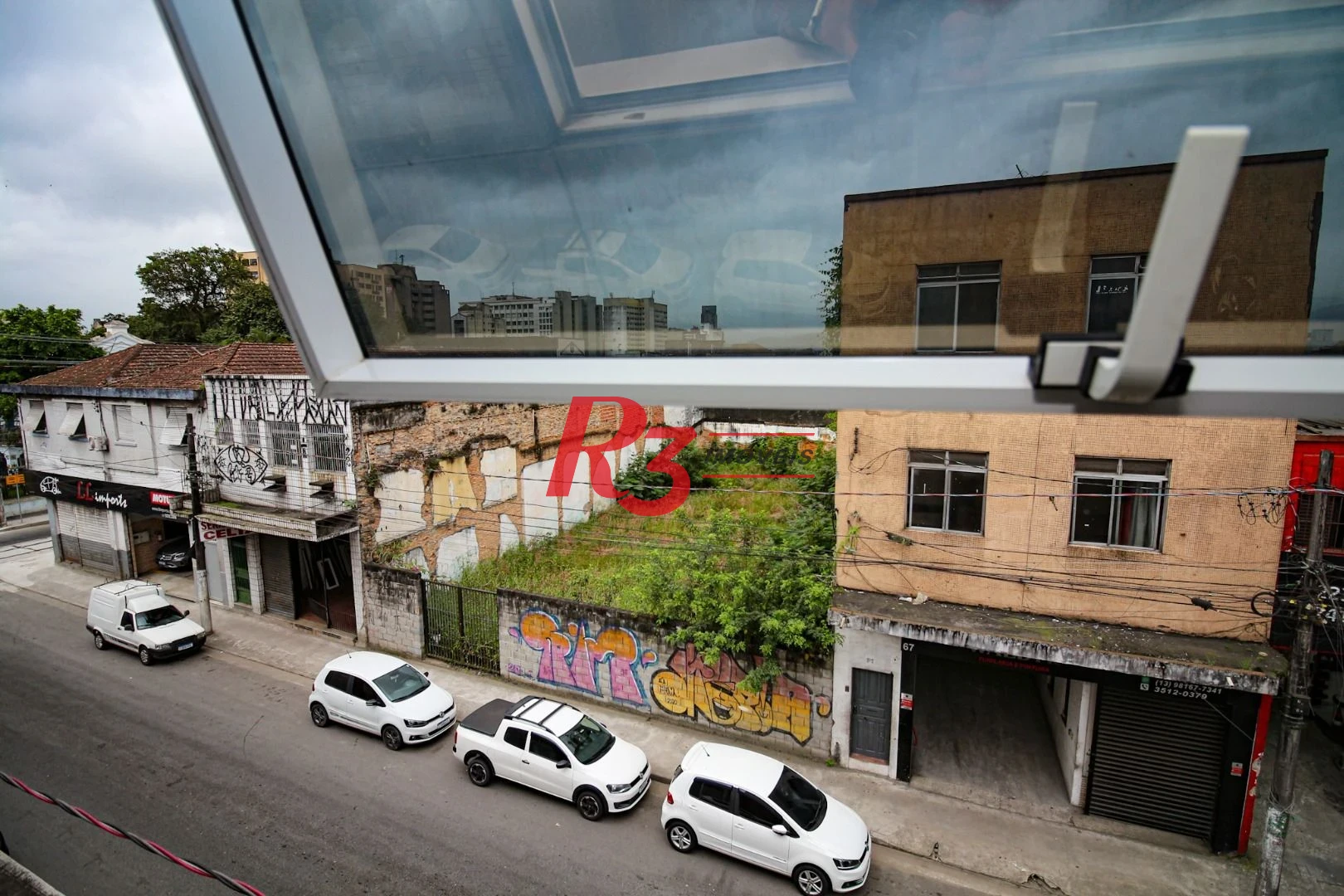 Prédio, 666 m² - venda por R$ 2.500.000,00 ou aluguel por R$ 25.000,00/mês - Vila Nova - Santos/SP