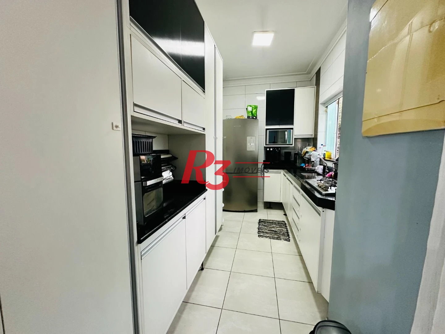 Sobrado com 4 dormitórios para alugar, 236 m² por R$ 18.104,17/mês - Embaré - Santos/SP