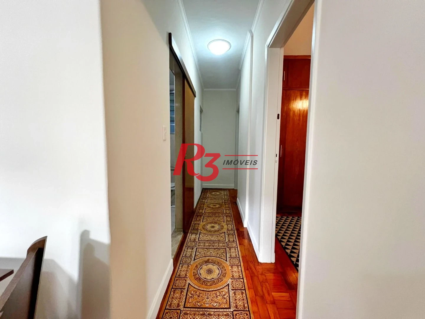 Apartamento com 3 dormitórios à venda, 90 m² por R$ 600.000,00 - Gonzaga - Santos/SP