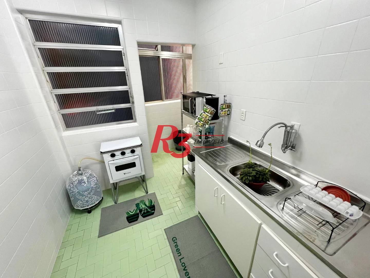 Apartamento com 3 dormitórios à venda, 90 m² por R$ 600.000,00 - Gonzaga - Santos/SP