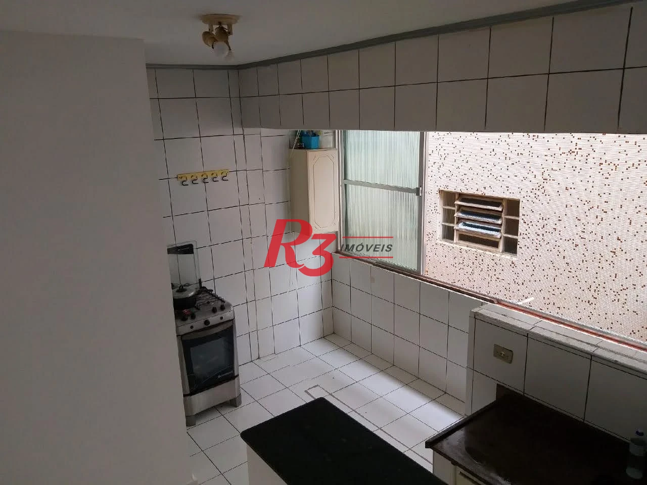 Apartamento com 2 dormitórios à venda, 75 m² por R$ 400.000,00 - Gonzaga - Santos/SP