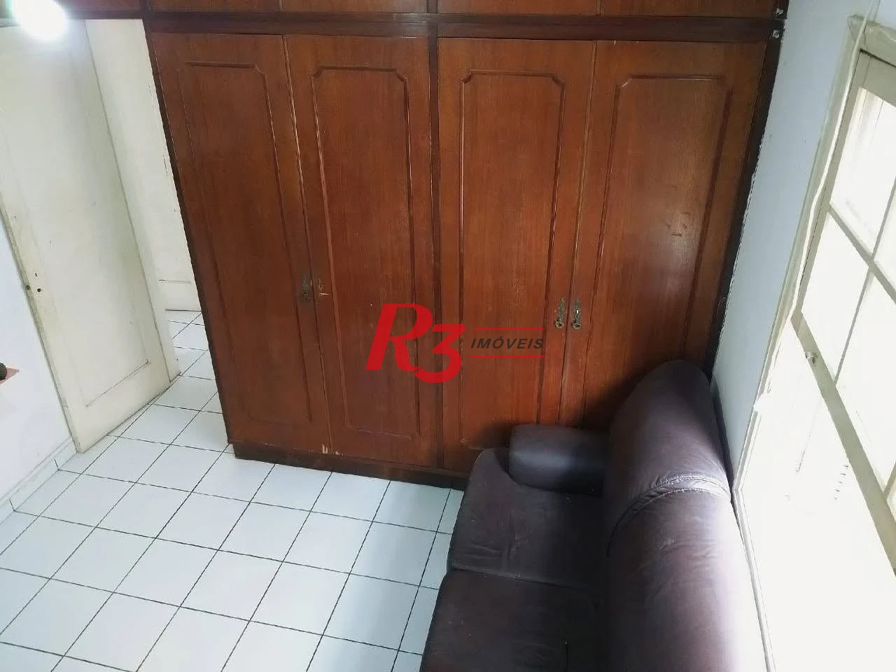 Apartamento com 2 dormitórios à venda, 75 m² por R$ 400.000,00 - Gonzaga - Santos/SP