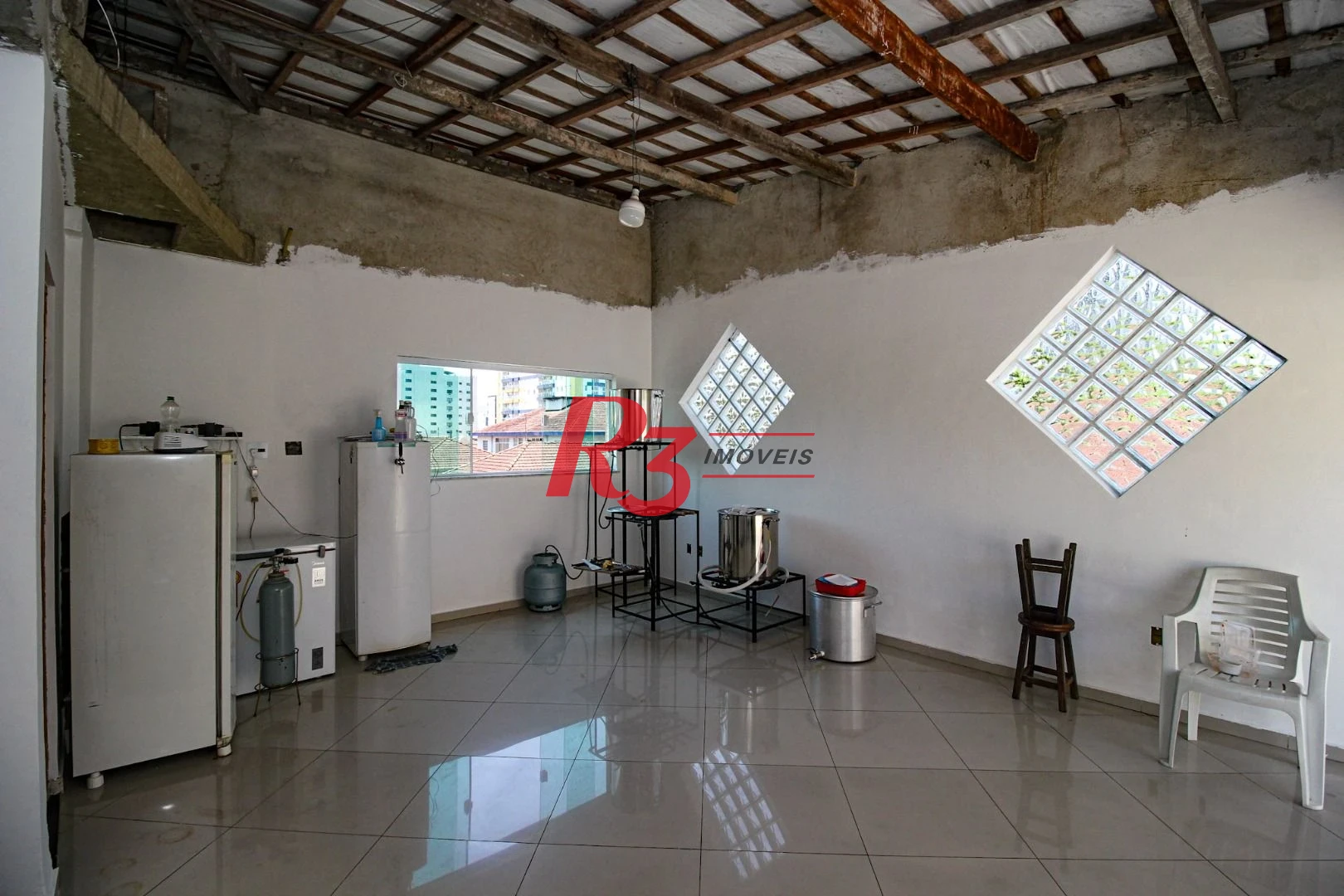 Sobrado com 3 dormitórios à venda, 250 m² por R$ 1.400.000,00 - Campo Grande - Santos/SP