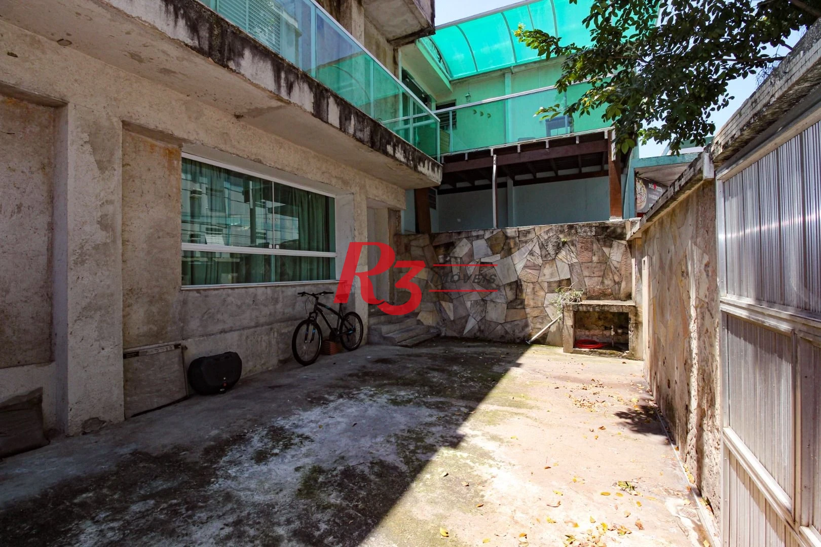 Sobrado com 3 dormitórios à venda, 250 m² por R$ 1.400.000,00 - Campo Grande - Santos/SP
