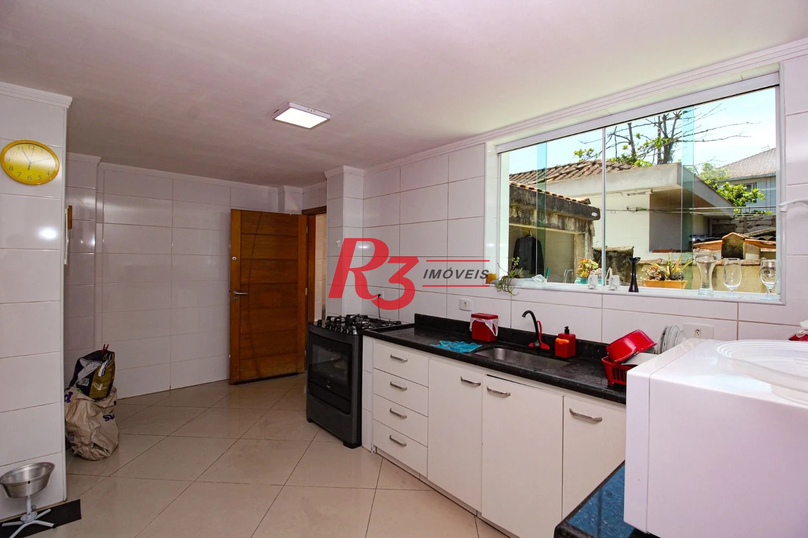 Sobrado com 3 dormitórios à venda, 250 m² por R$ 1.400.000,00 - Campo Grande - Santos/SP