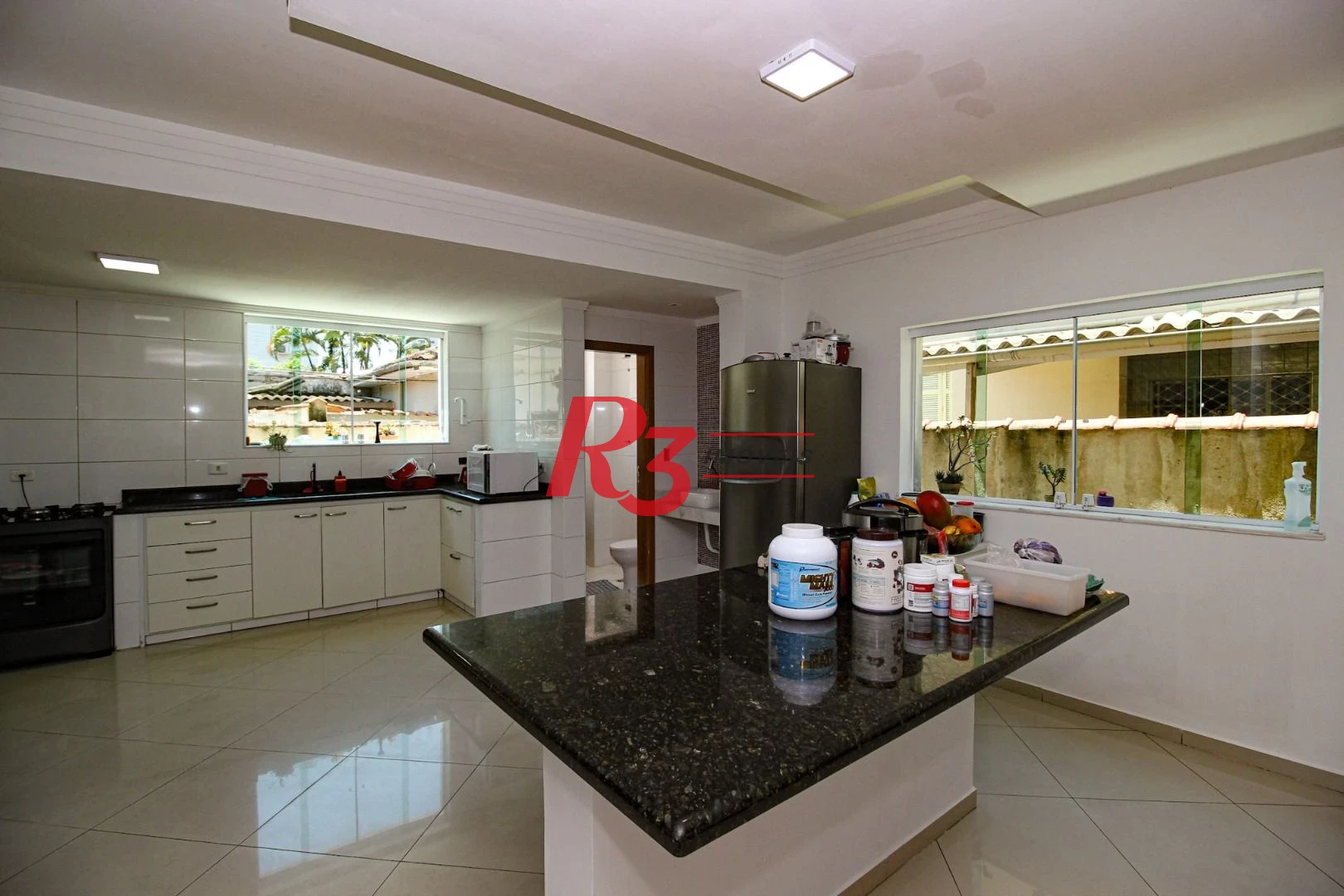 Sobrado com 3 dormitórios à venda, 250 m² por R$ 1.400.000,00 - Campo Grande - Santos/SP