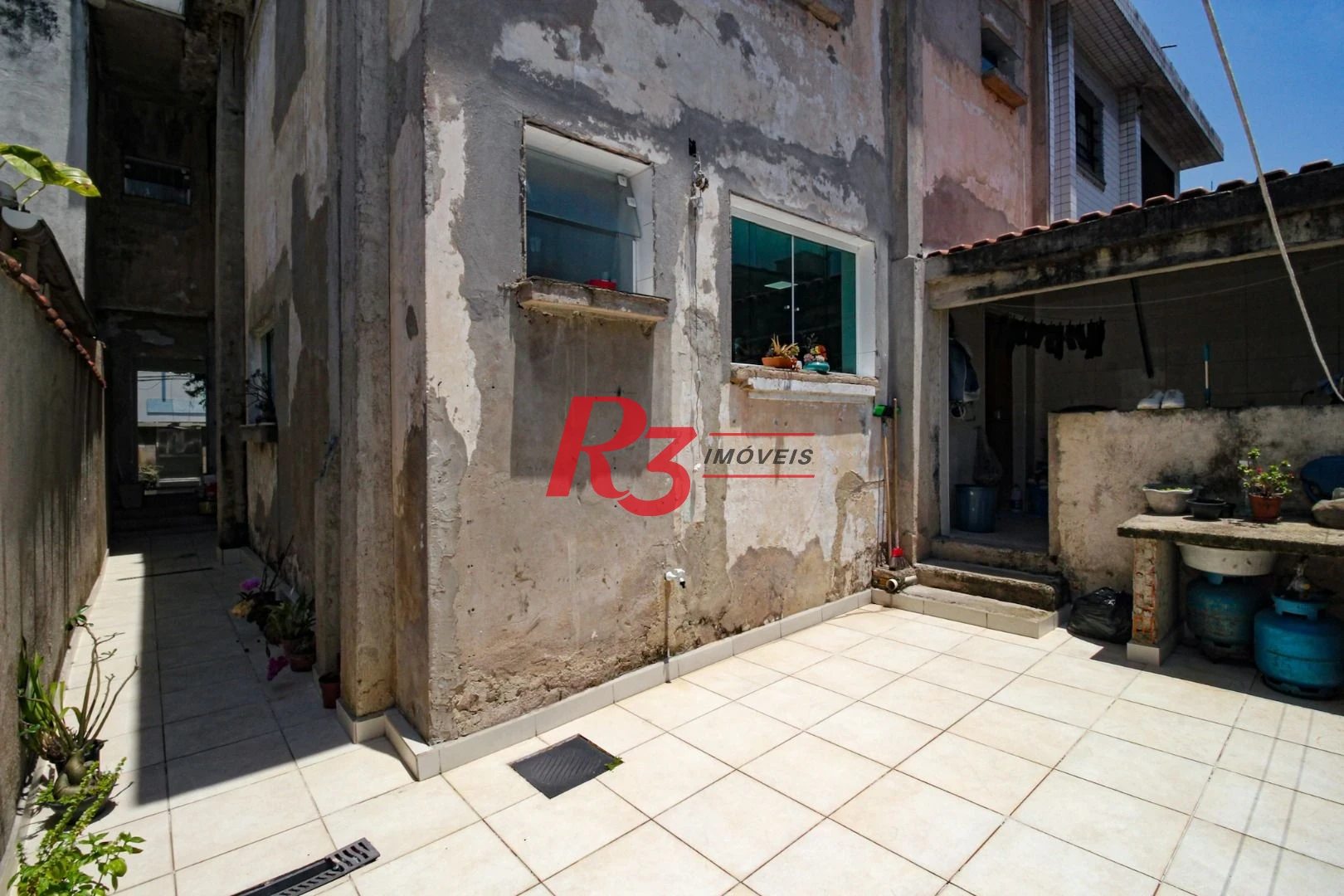 Sobrado com 3 dormitórios à venda, 250 m² por R$ 1.400.000,00 - Campo Grande - Santos/SP