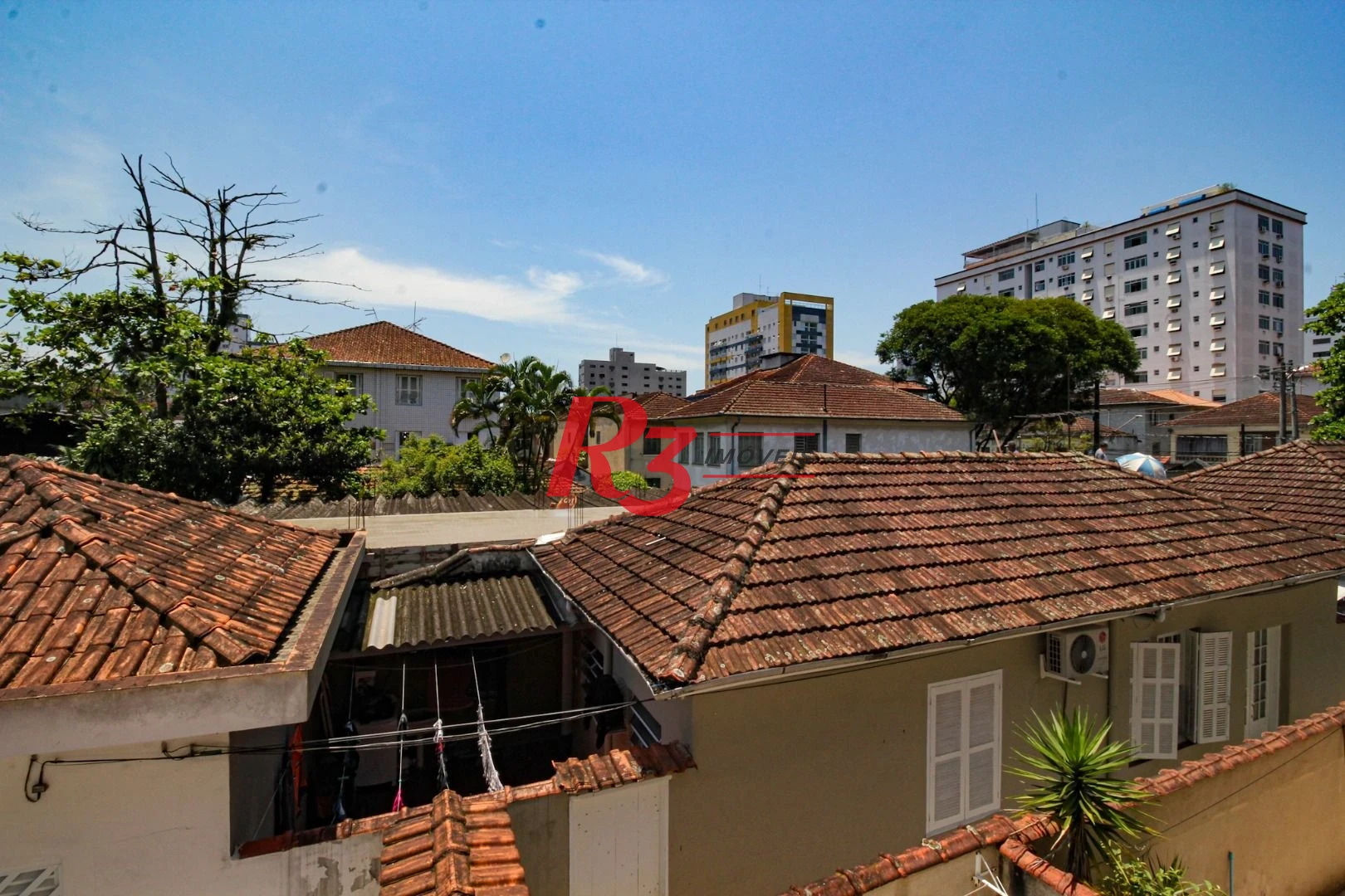Sobrado com 3 dormitórios à venda, 250 m² por R$ 1.400.000,00 - Campo Grande - Santos/SP
