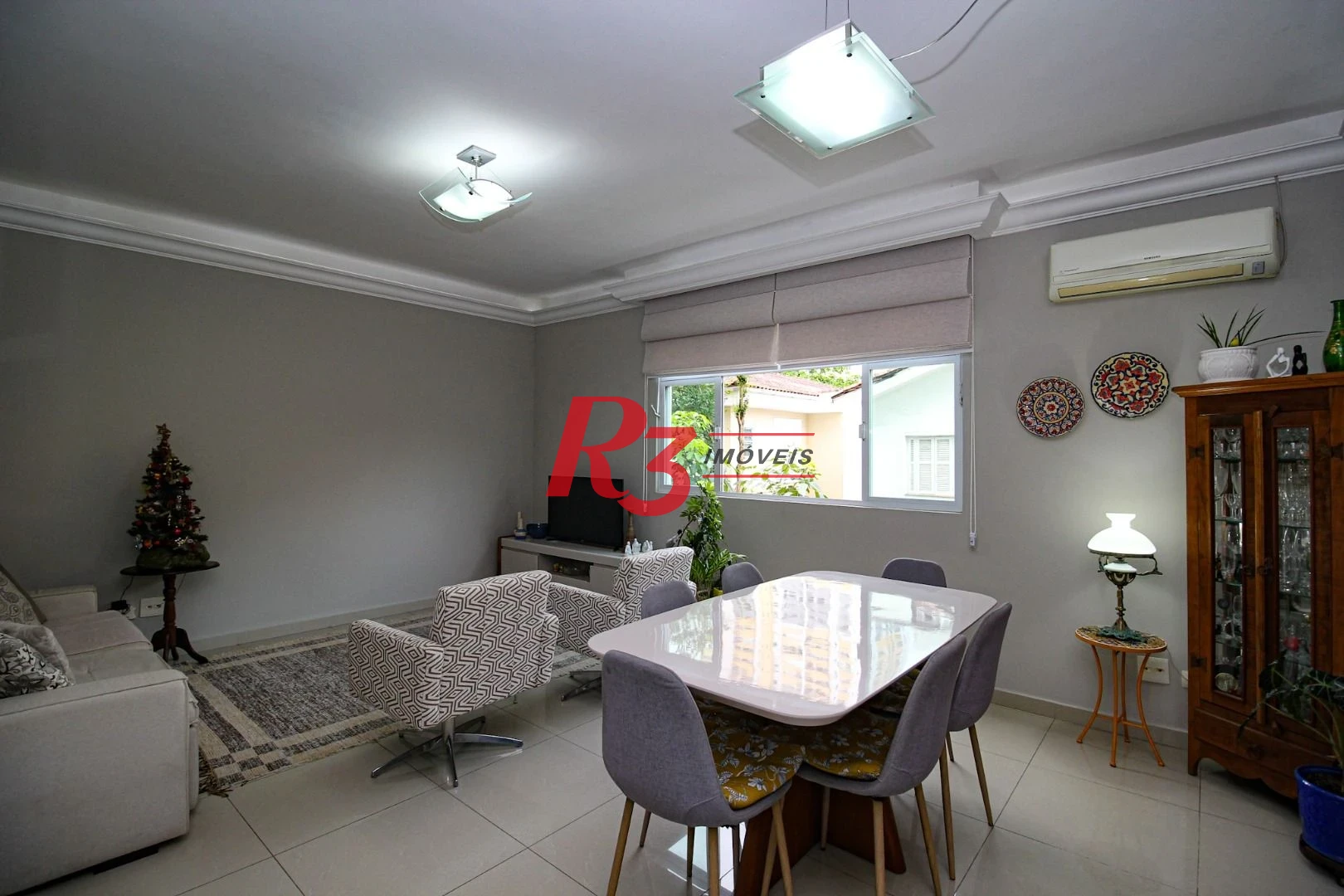 Casa com 3 dormitórios à venda, 136 m² por R$ 1.150.000,00 - Gonzaga - Santos/SP