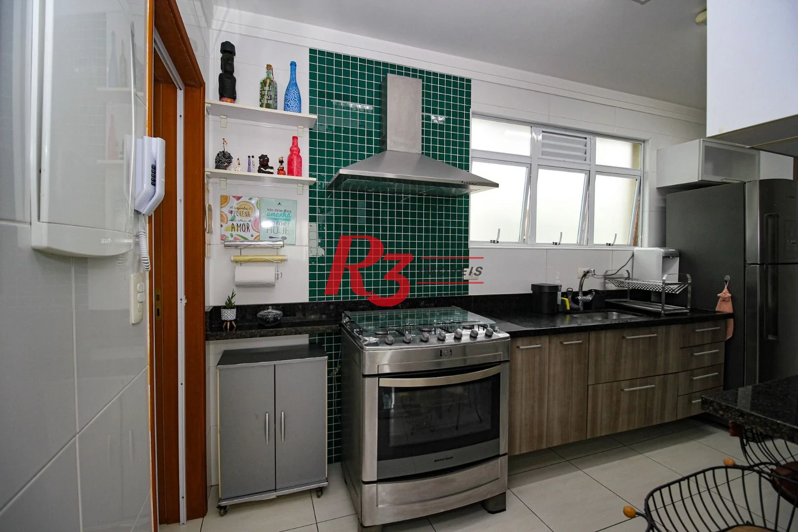 Casa com 3 dormitórios à venda, 136 m² por R$ 1.150.000,00 - Gonzaga - Santos/SP