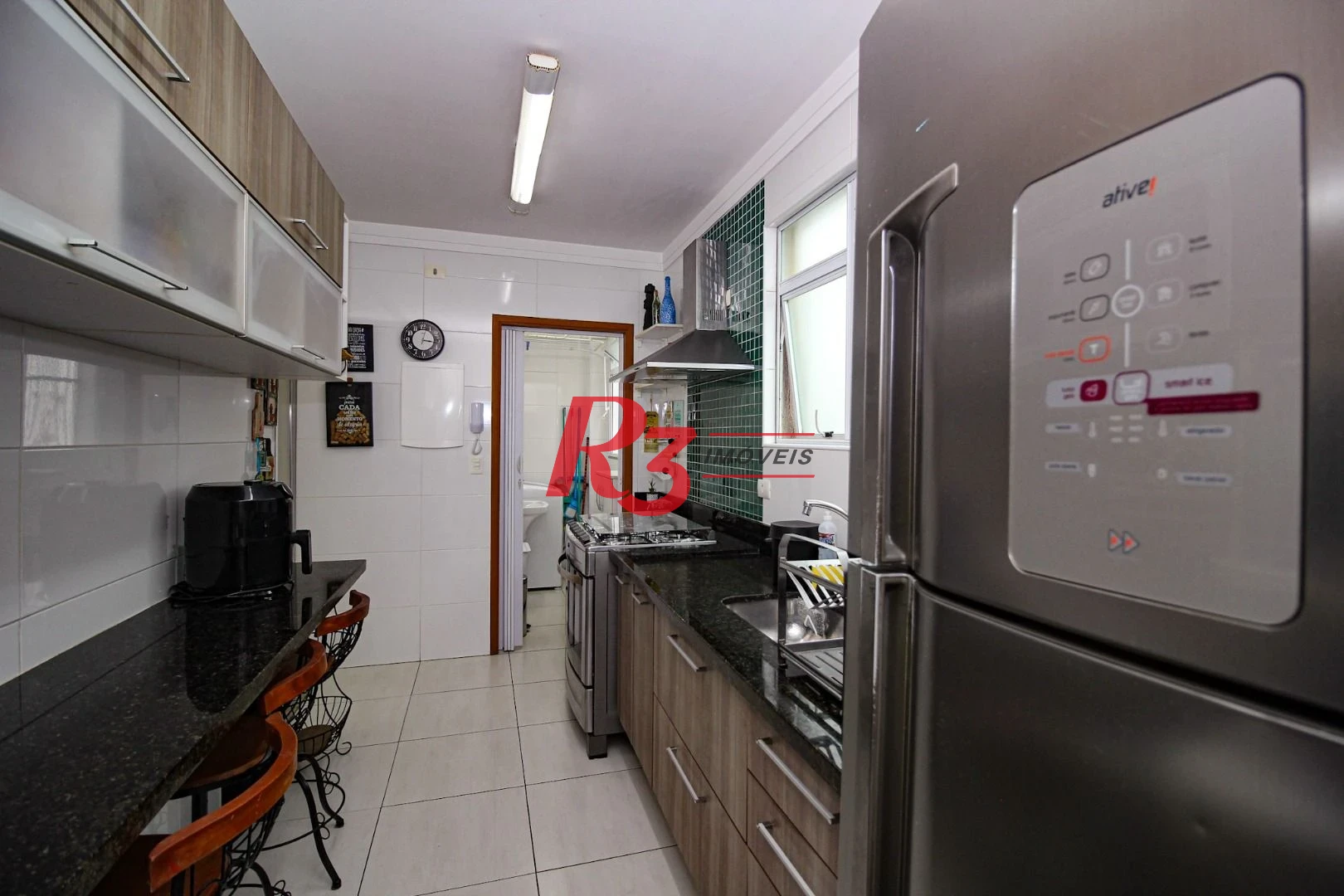 Casa com 3 dormitórios à venda, 136 m² por R$ 1.150.000,00 - Gonzaga - Santos/SP