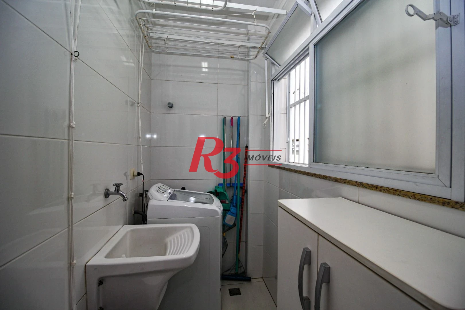 Casa com 3 dormitórios à venda, 136 m² por R$ 1.150.000,00 - Gonzaga - Santos/SP