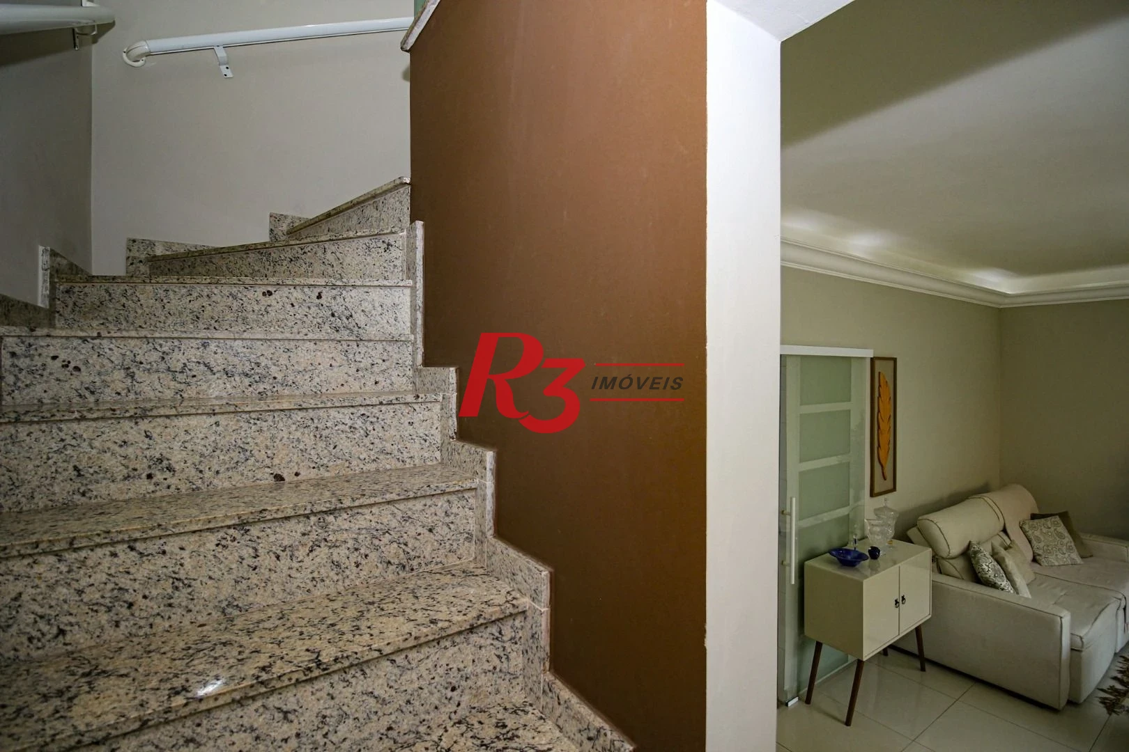 Casa com 3 dormitórios à venda, 136 m² por R$ 1.150.000,00 - Gonzaga - Santos/SP