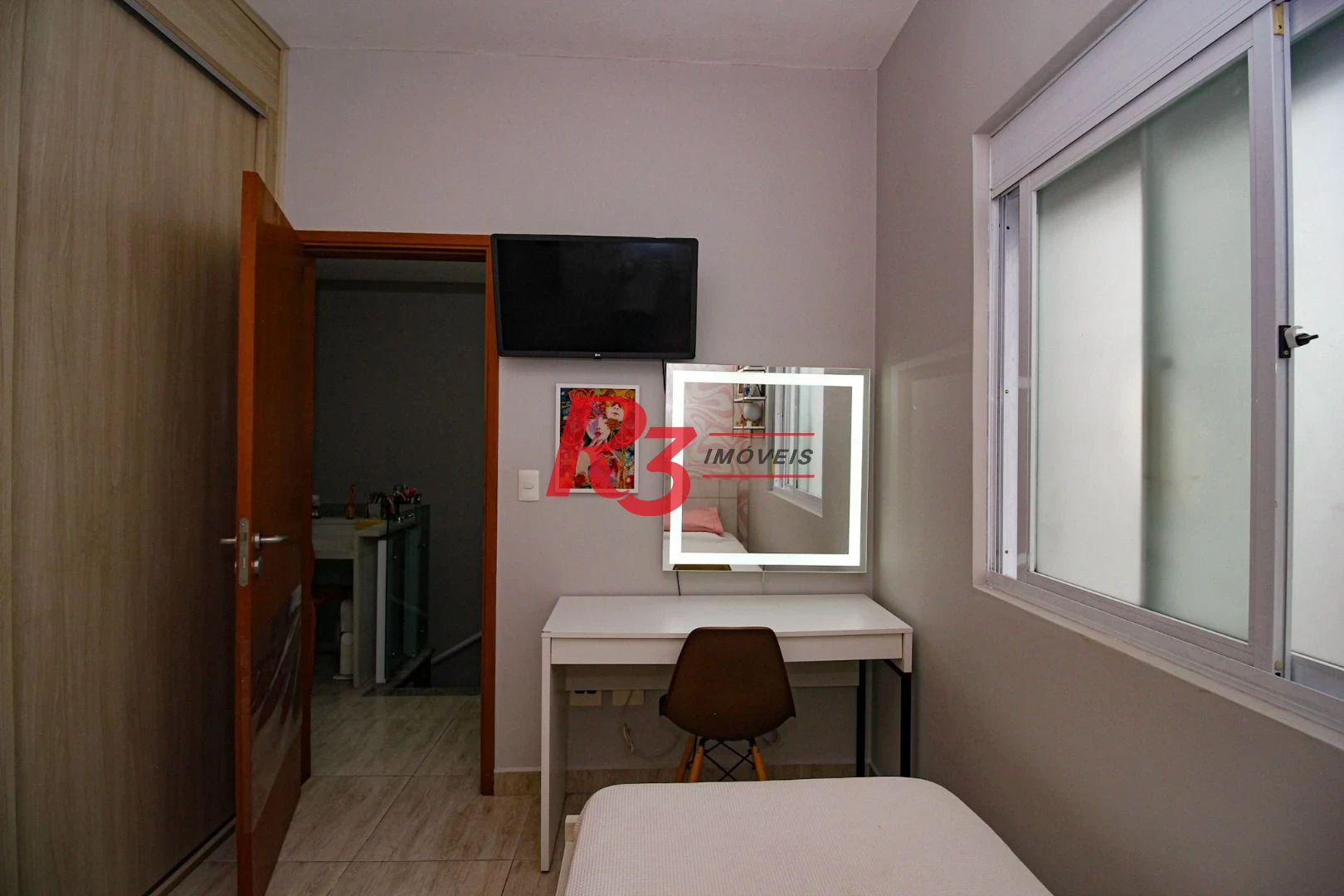 Casa com 3 dormitórios à venda, 136 m² por R$ 1.150.000,00 - Gonzaga - Santos/SP