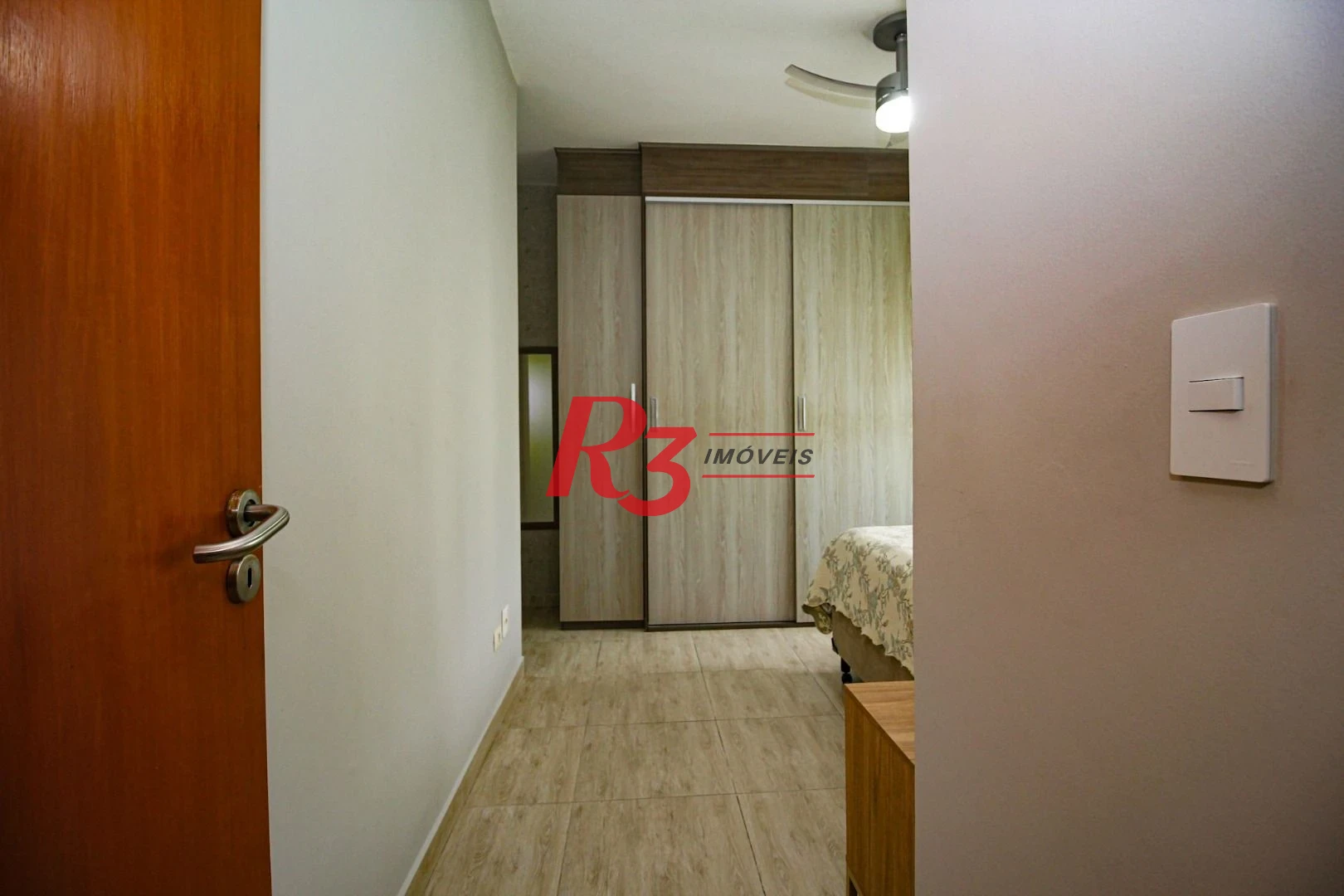 Casa com 3 dormitórios à venda, 136 m² por R$ 1.150.000,00 - Gonzaga - Santos/SP
