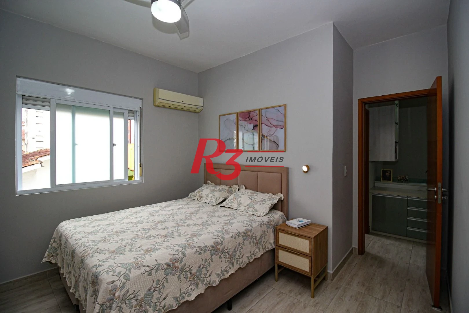 Casa com 3 dormitórios à venda, 136 m² por R$ 1.150.000,00 - Gonzaga - Santos/SP