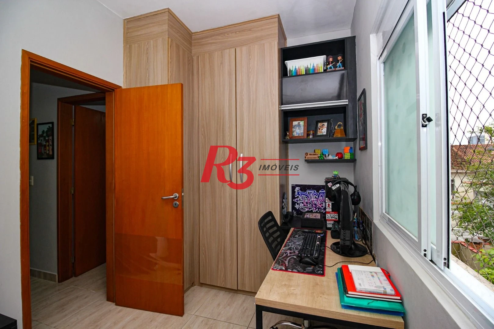 Casa com 3 dormitórios à venda, 136 m² por R$ 1.150.000,00 - Gonzaga - Santos/SP
