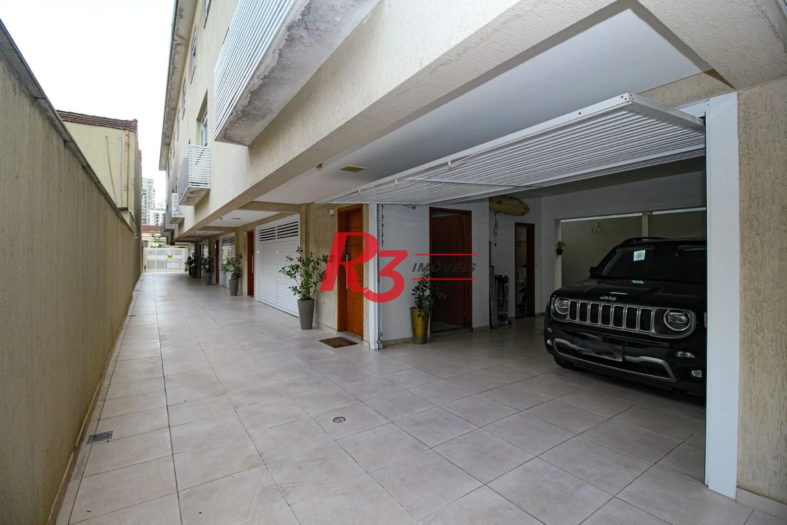 Casa com 3 dormitórios à venda, 136 m² por R$ 1.150.000,00 - Gonzaga - Santos/SP