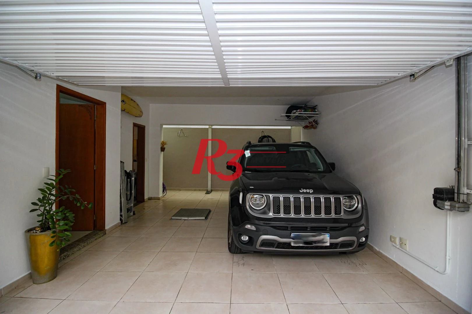 Casa com 3 dormitórios à venda, 136 m² por R$ 1.150.000,00 - Gonzaga - Santos/SP