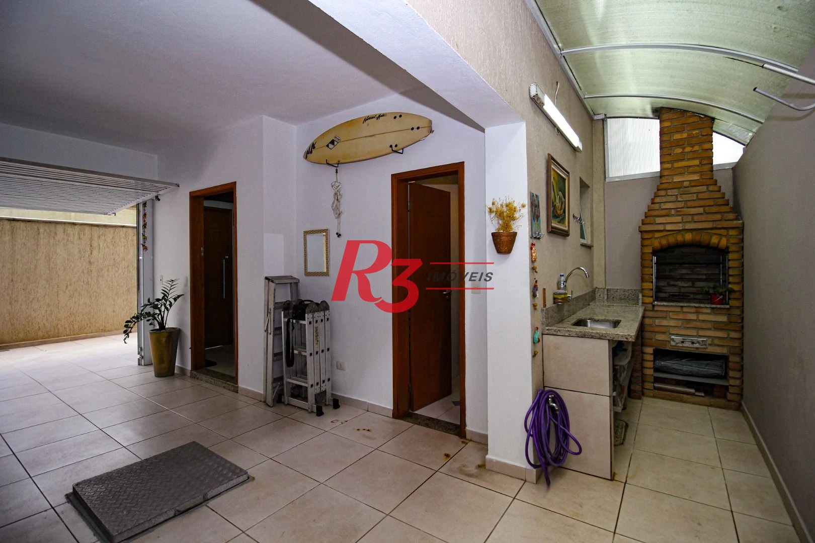 Casa com 3 dormitórios à venda, 136 m² por R$ 1.150.000,00 - Gonzaga - Santos/SP