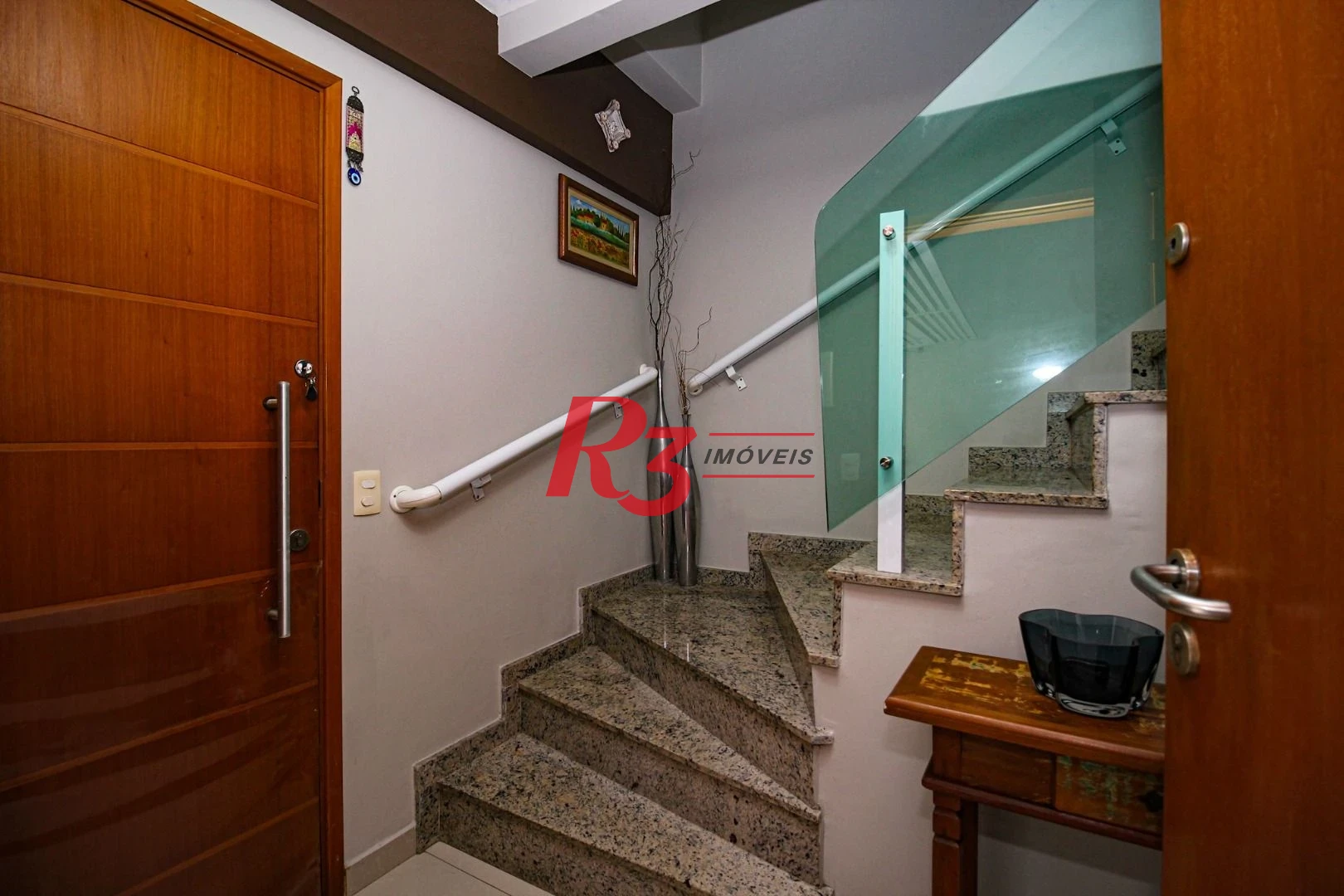 Casa com 3 dormitórios à venda, 136 m² por R$ 1.150.000,00 - Gonzaga - Santos/SP