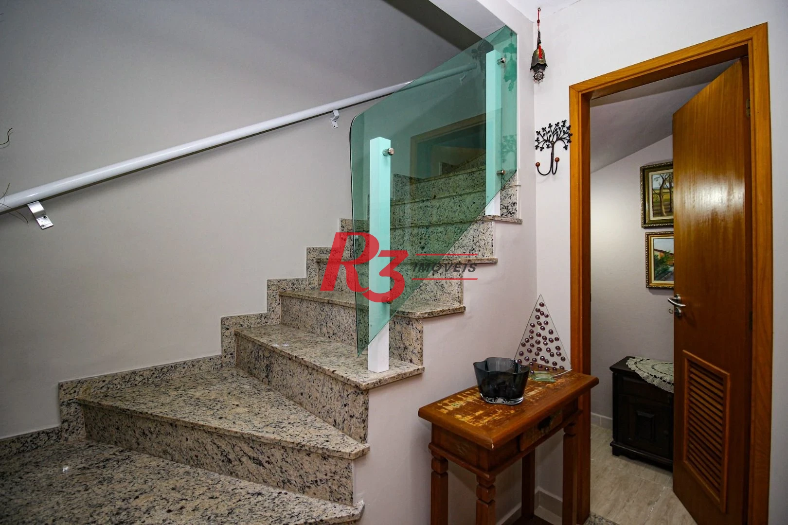Casa com 3 dormitórios à venda, 136 m² por R$ 1.150.000,00 - Gonzaga - Santos/SP