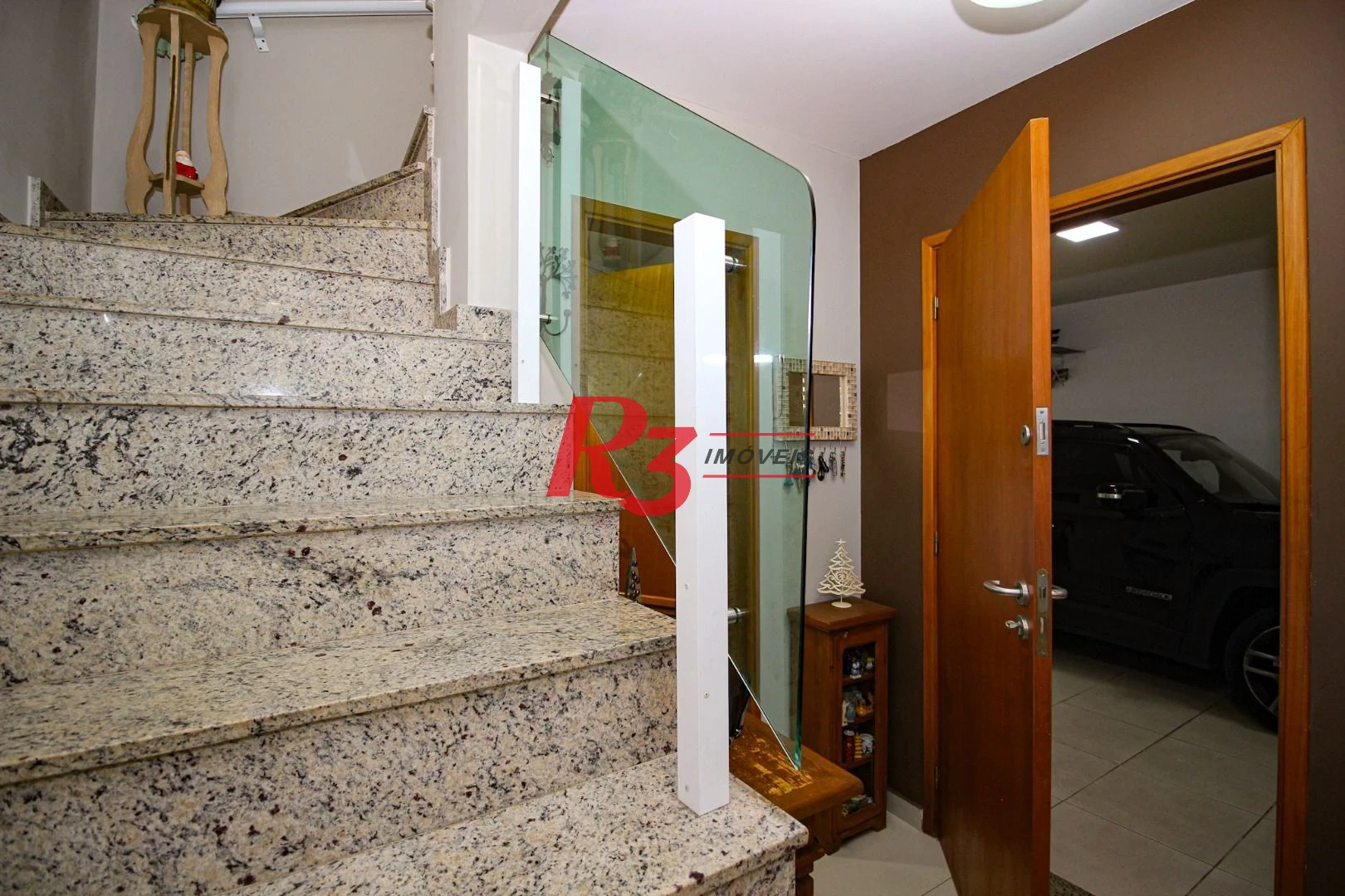 Casa com 3 dormitórios à venda, 136 m² por R$ 1.150.000,00 - Gonzaga - Santos/SP