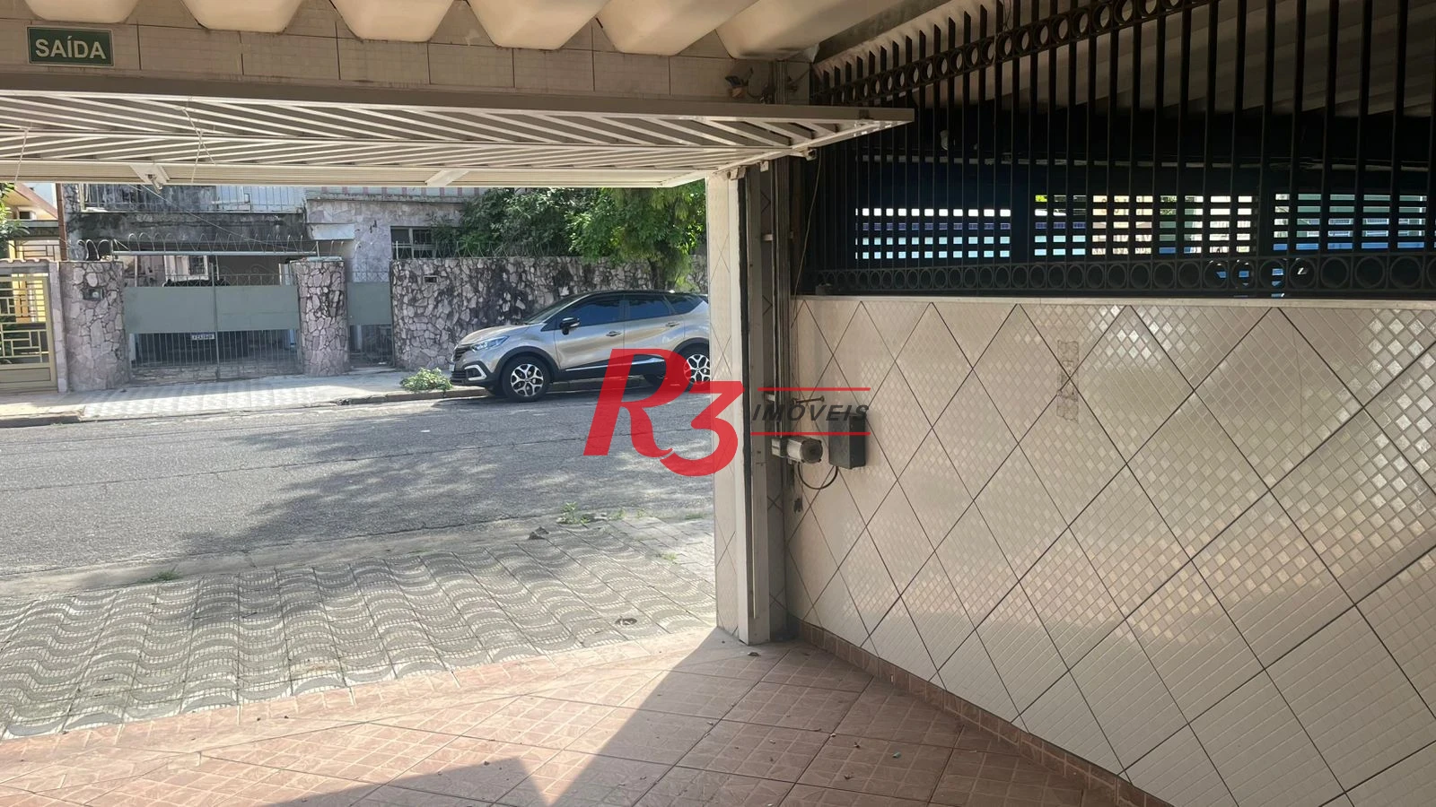 Casa com 3 dormitórios à venda, 171 m² por R$ 900.000,00 - Ponta da Praia - Santos/SP