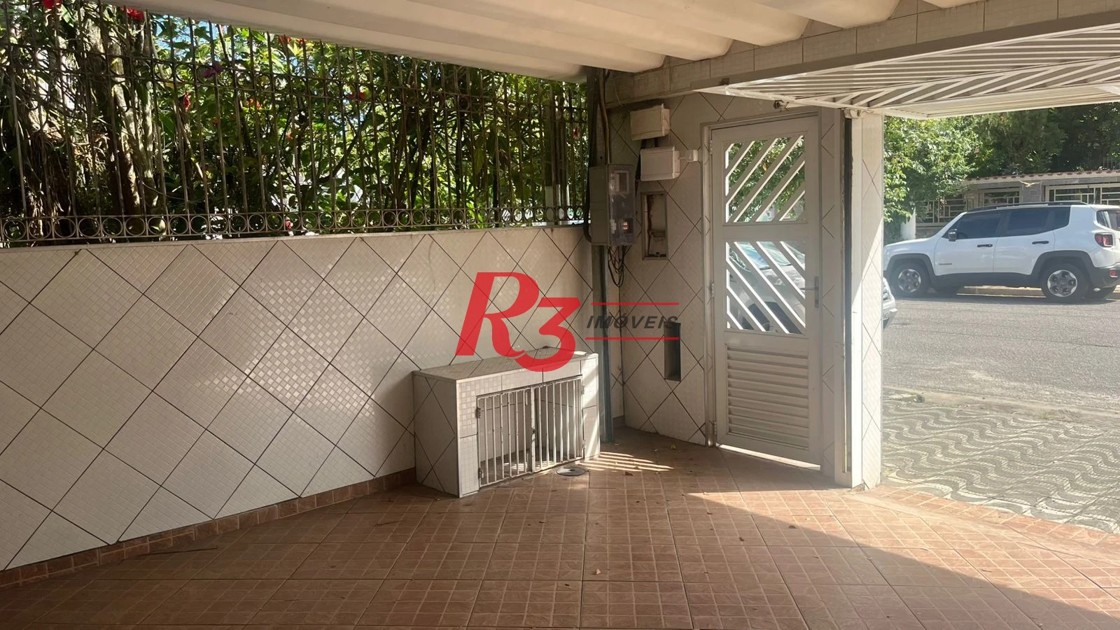 Casa com 3 dormitórios à venda, 171 m² por R$ 900.000,00 - Ponta da Praia - Santos/SP