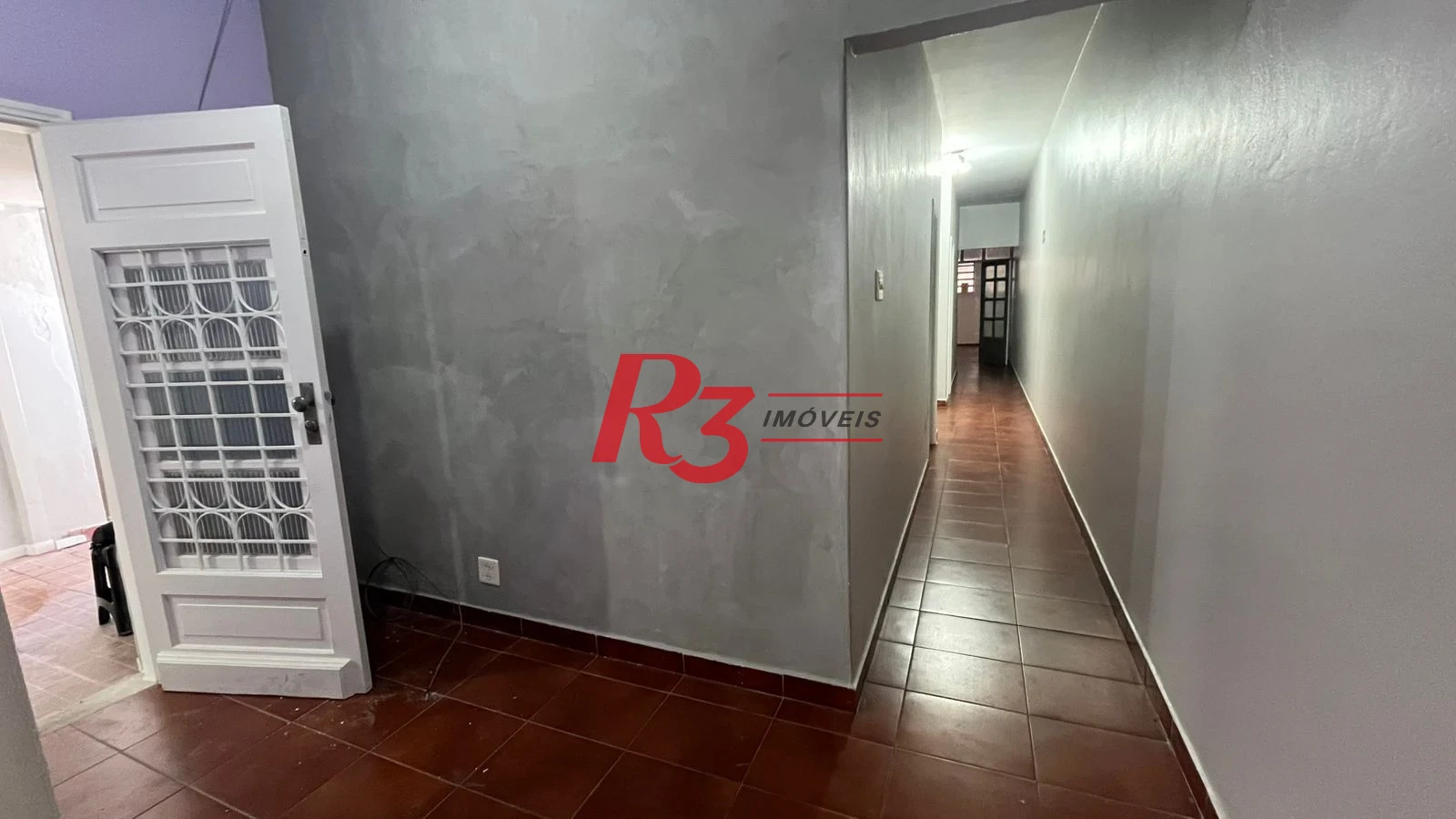 Casa com 3 dormitórios à venda, 171 m² por R$ 900.000,00 - Ponta da Praia - Santos/SP