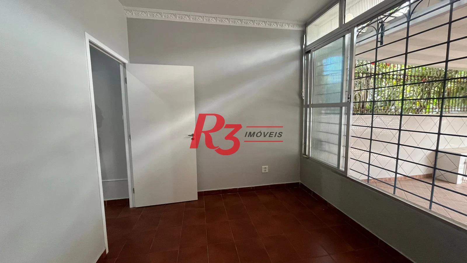 Casa com 3 dormitórios à venda, 171 m² por R$ 900.000,00 - Ponta da Praia - Santos/SP