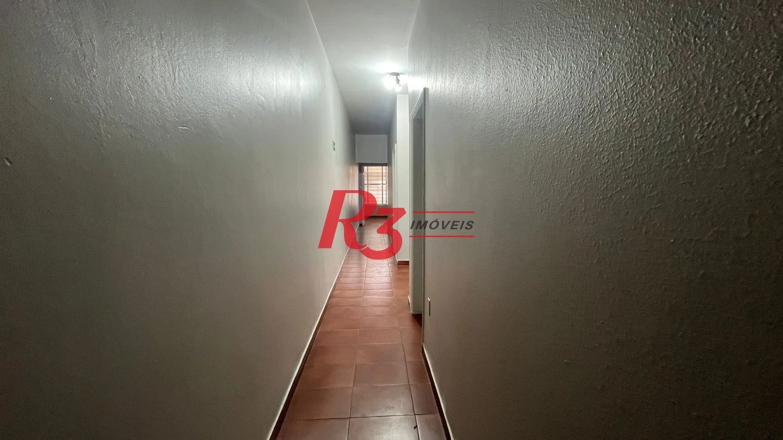 Casa com 3 dormitórios à venda, 171 m² por R$ 900.000,00 - Ponta da Praia - Santos/SP
