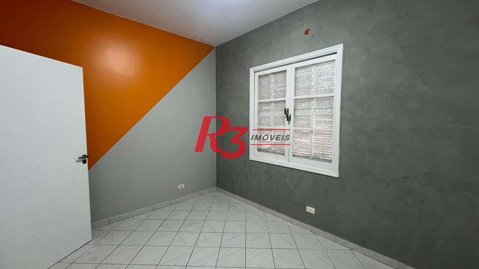 Casa com 3 dormitórios à venda, 171 m² por R$ 900.000,00 - Ponta da Praia - Santos/SP